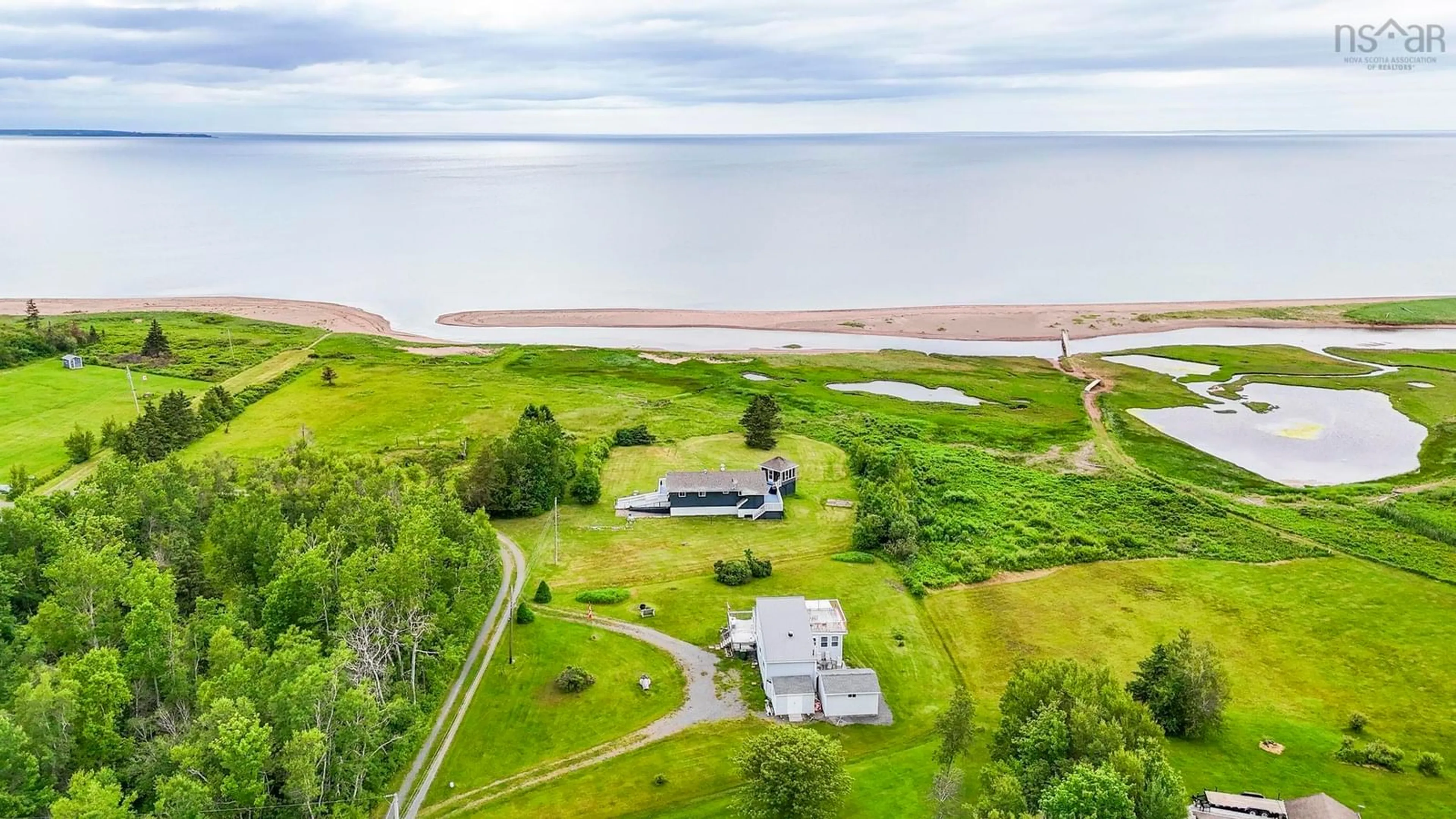 A pic from outside/outdoor area/front of a property/back of a property/a pic from drone, water/lake/river/ocean view for 7 Davies Road Branch, Malagash Mine Nova Scotia B0K 1E0