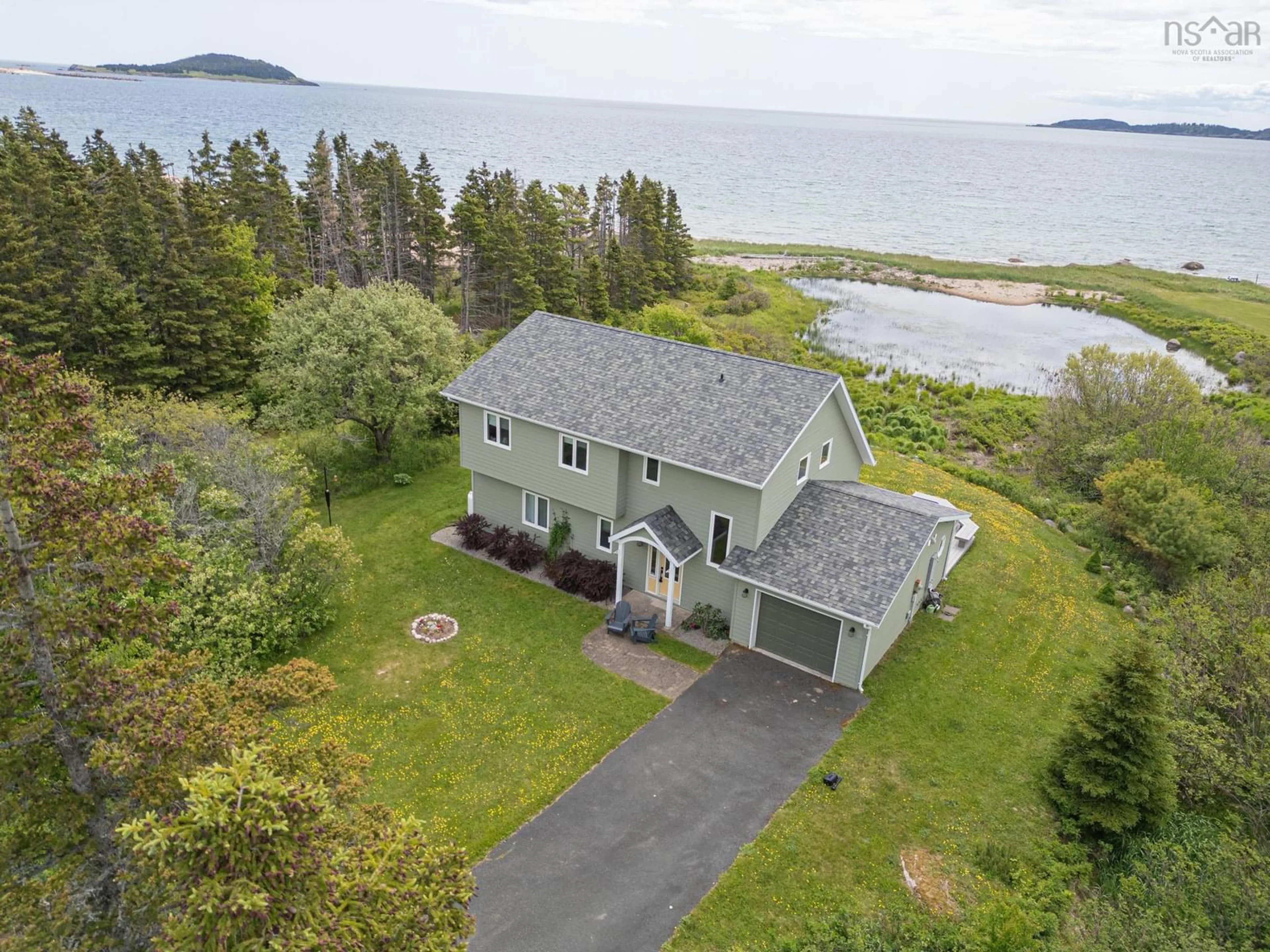 A pic from outside/outdoor area/front of a property/back of a property/a pic from drone, water/lake/river/ocean view for 36237 Cabot Trail, Ingonish Nova Scotia B0K 1K0