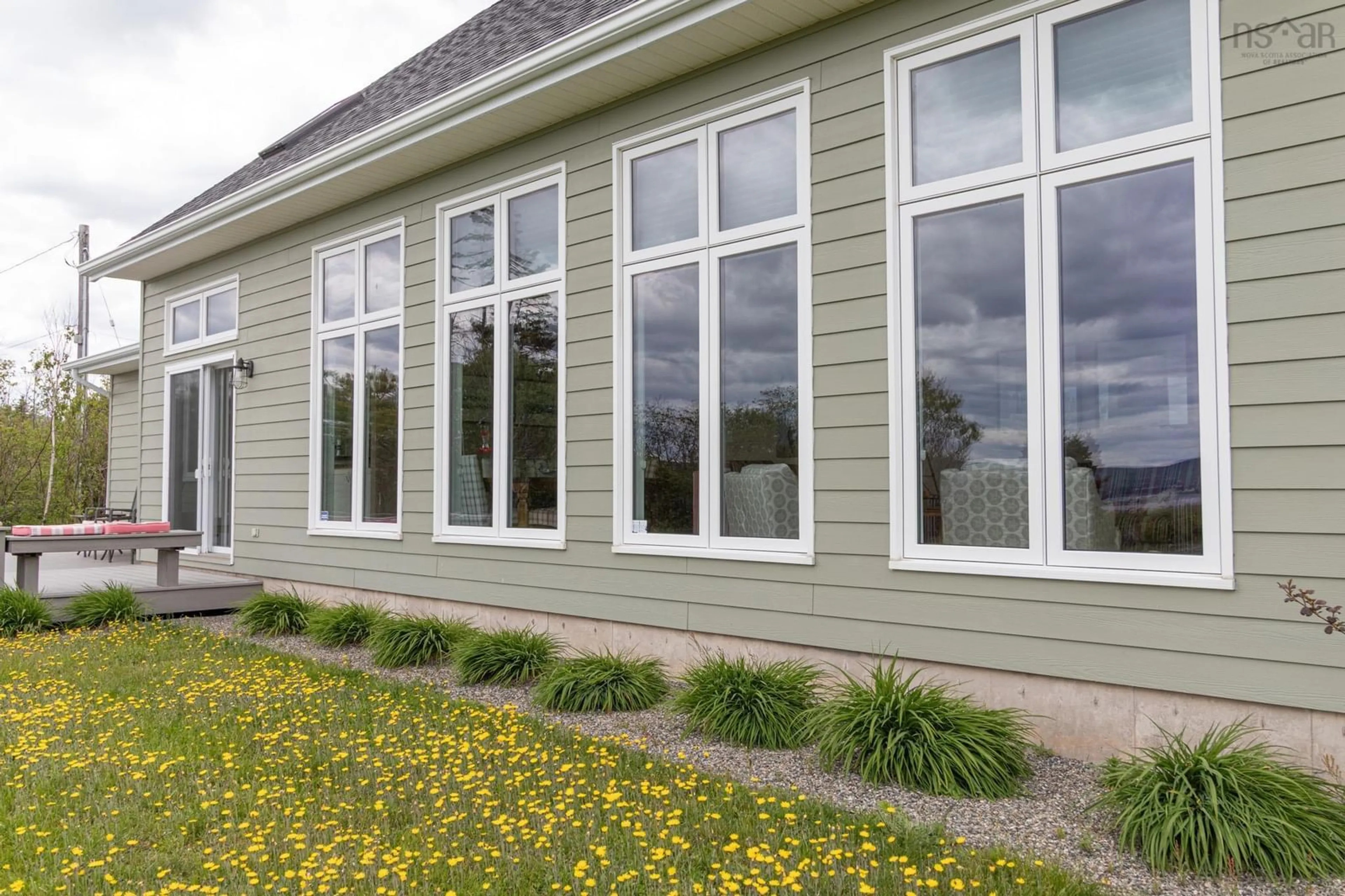 Home with vinyl exterior material, building for 36237 Cabot Trail, Ingonish Nova Scotia B0K 1K0