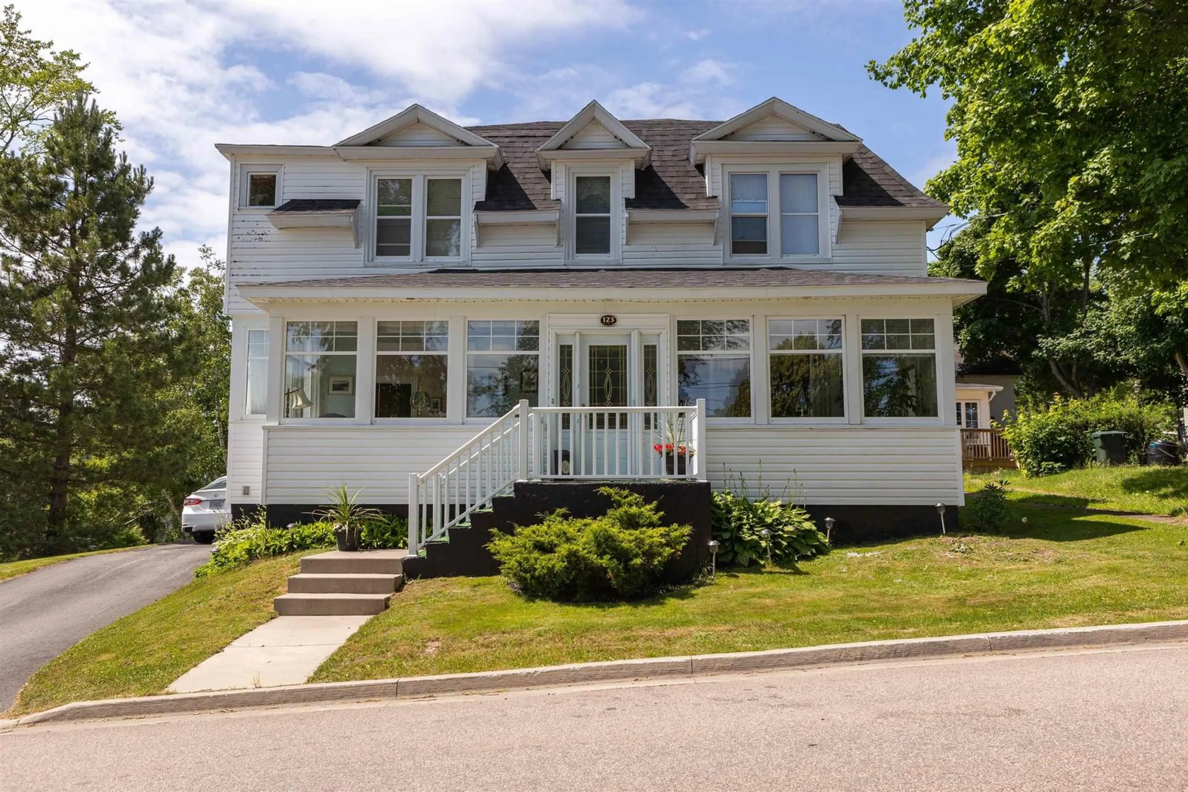 Home with vinyl exterior material, street for 123 Royal Ave, Sydney Nova Scotia B1P 4M4