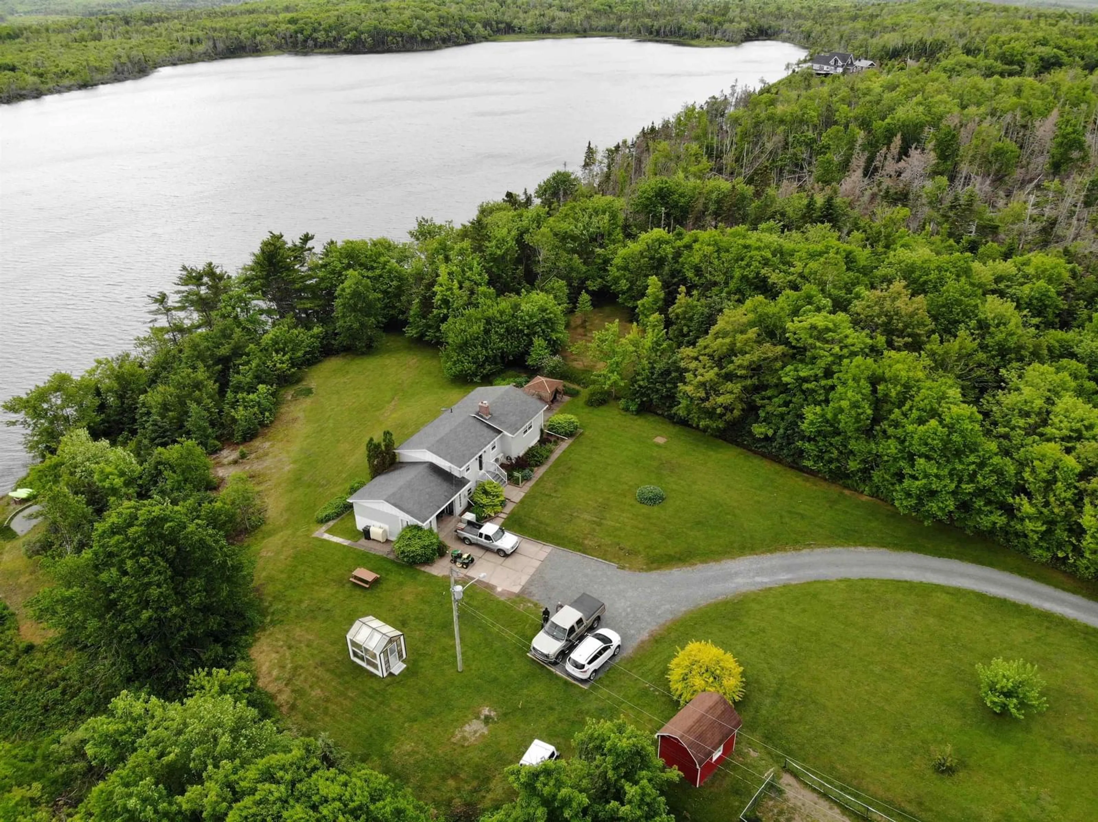 A pic from outside/outdoor area/front of a property/back of a property/a pic from drone, water/lake/river/ocean view for 5000 Louisbourg Highway Hwy, Albert Bridge Nova Scotia B1K 3T9