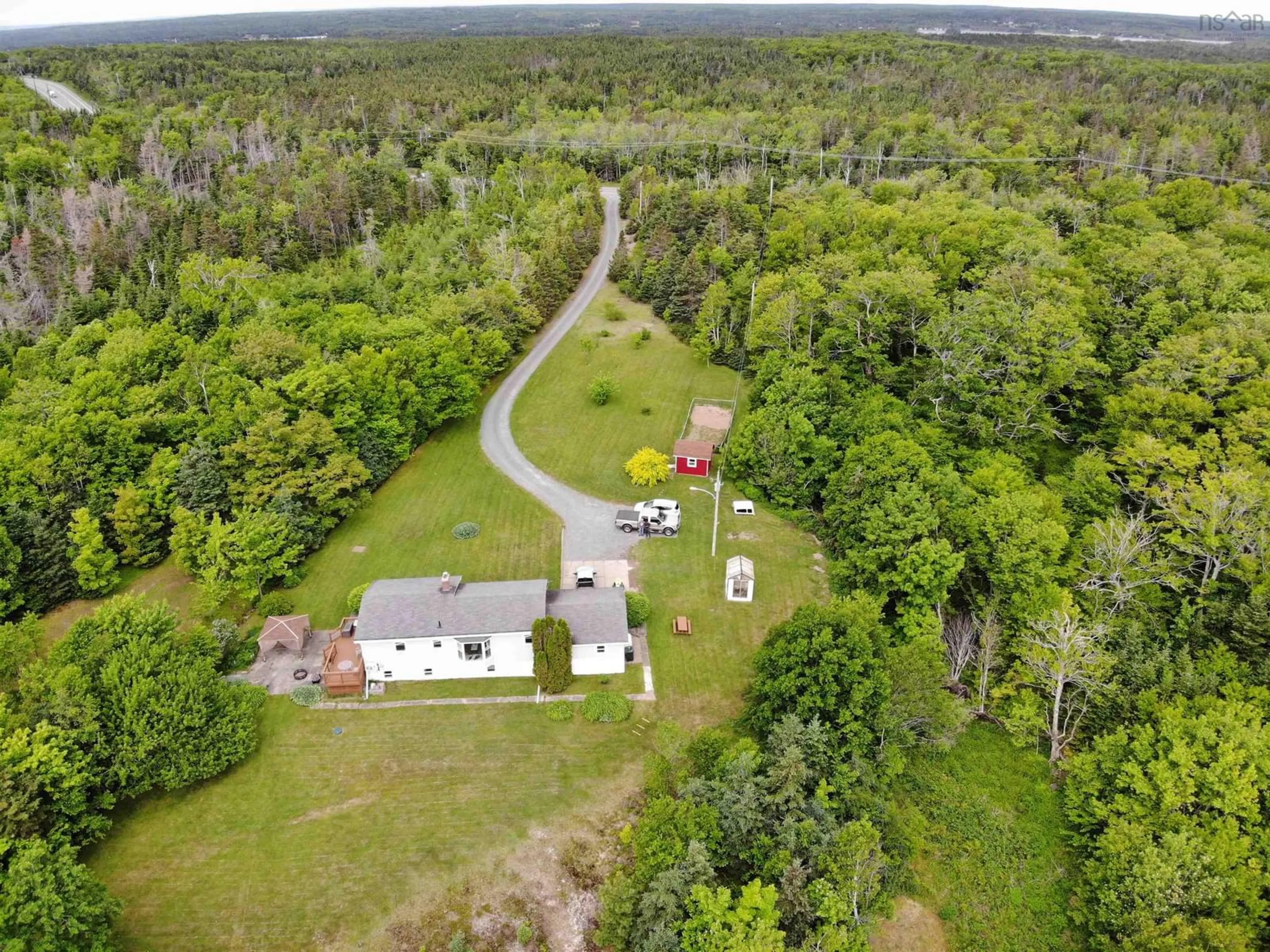 A pic from outside/outdoor area/front of a property/back of a property/a pic from drone, forest/trees view for 5000 Louisbourg Highway Hwy, Albert Bridge Nova Scotia B1K 3T9