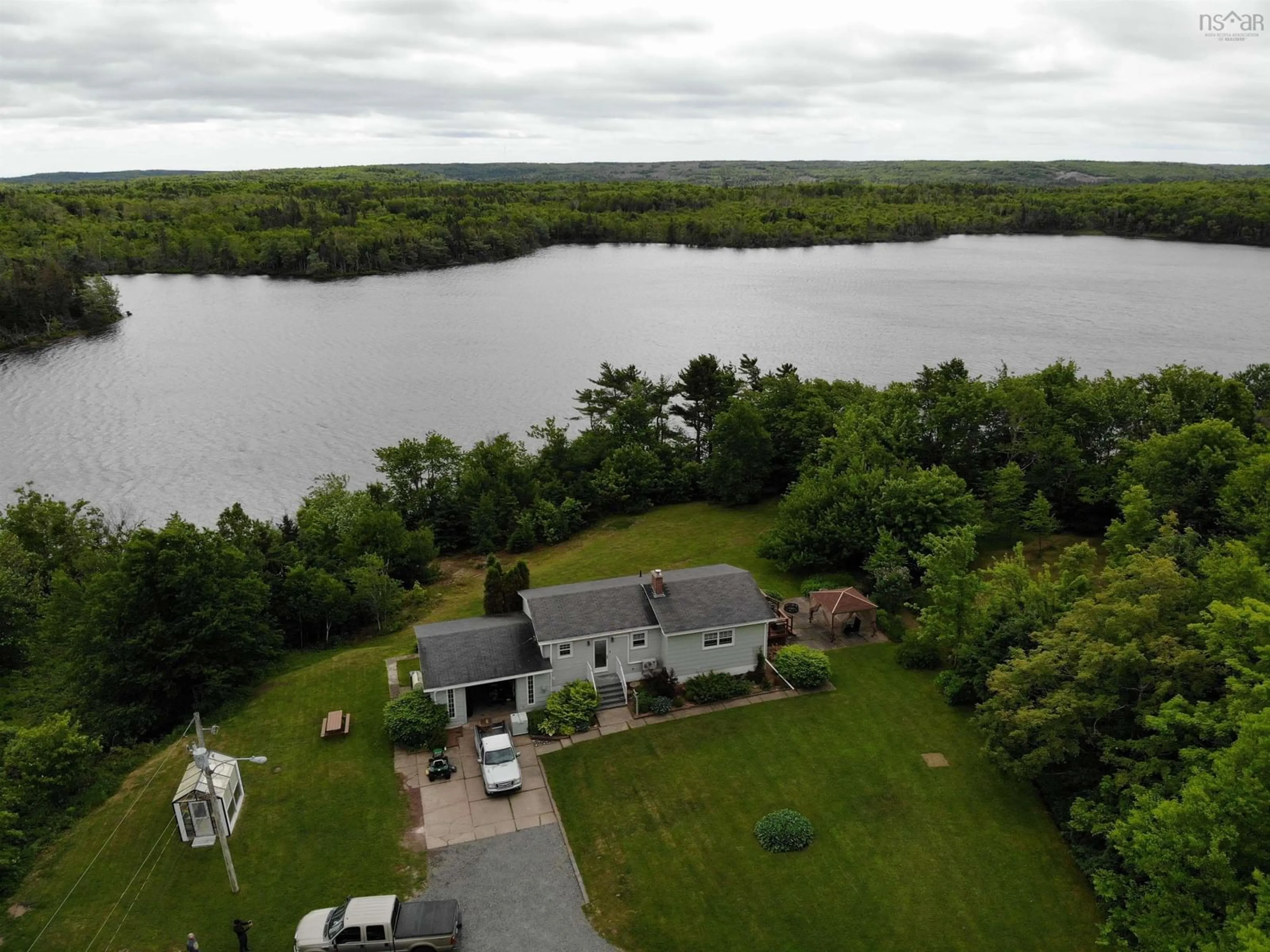 A pic from outside/outdoor area/front of a property/back of a property/a pic from drone, water/lake/river/ocean view for 5000 Louisbourg Highway Hwy, Albert Bridge Nova Scotia B1K 3T9