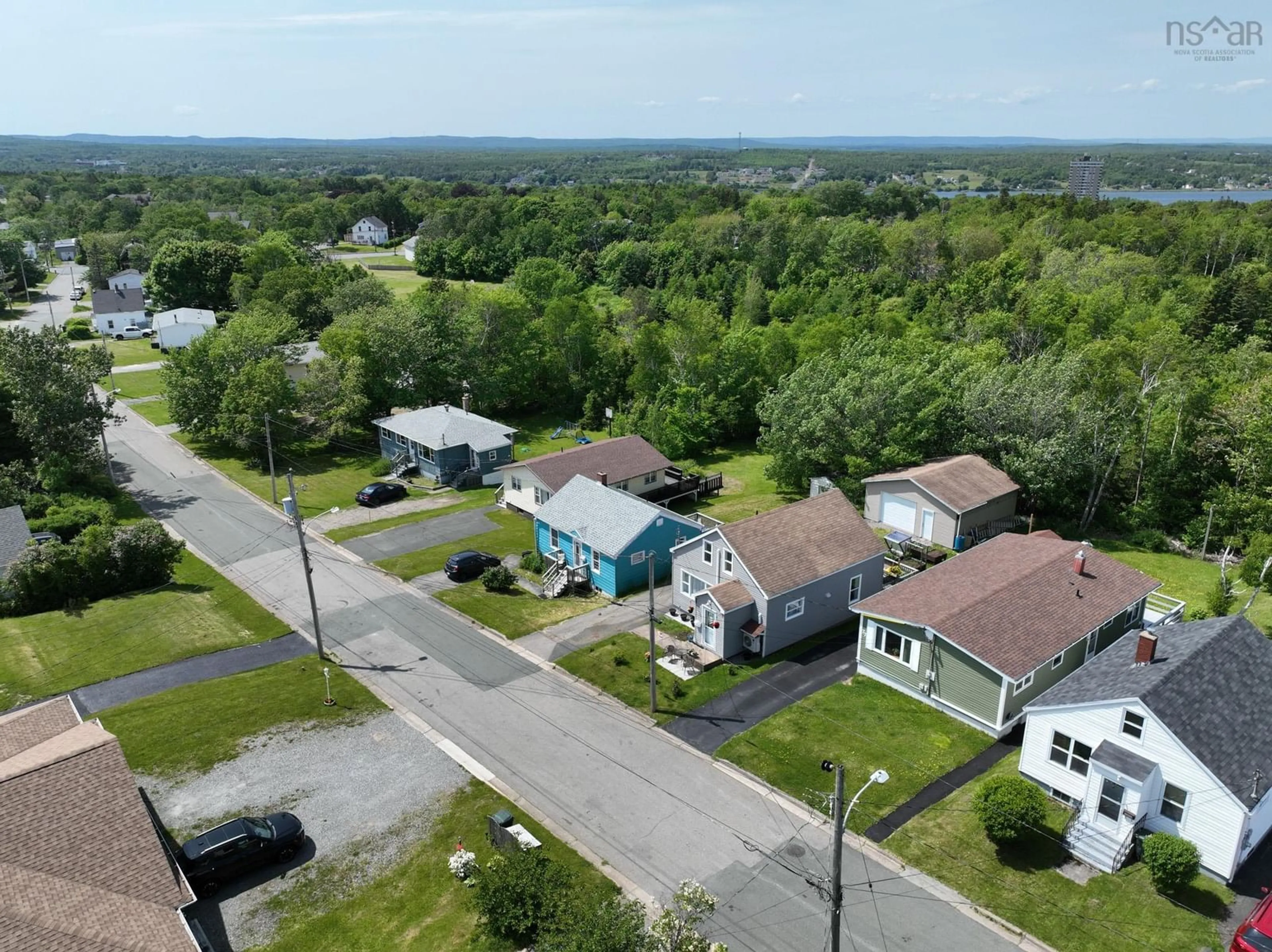 A pic from outside/outdoor area/front of a property/back of a property/a pic from drone, street for 77 Brown St, Sydney Nova Scotia B1S 2M6