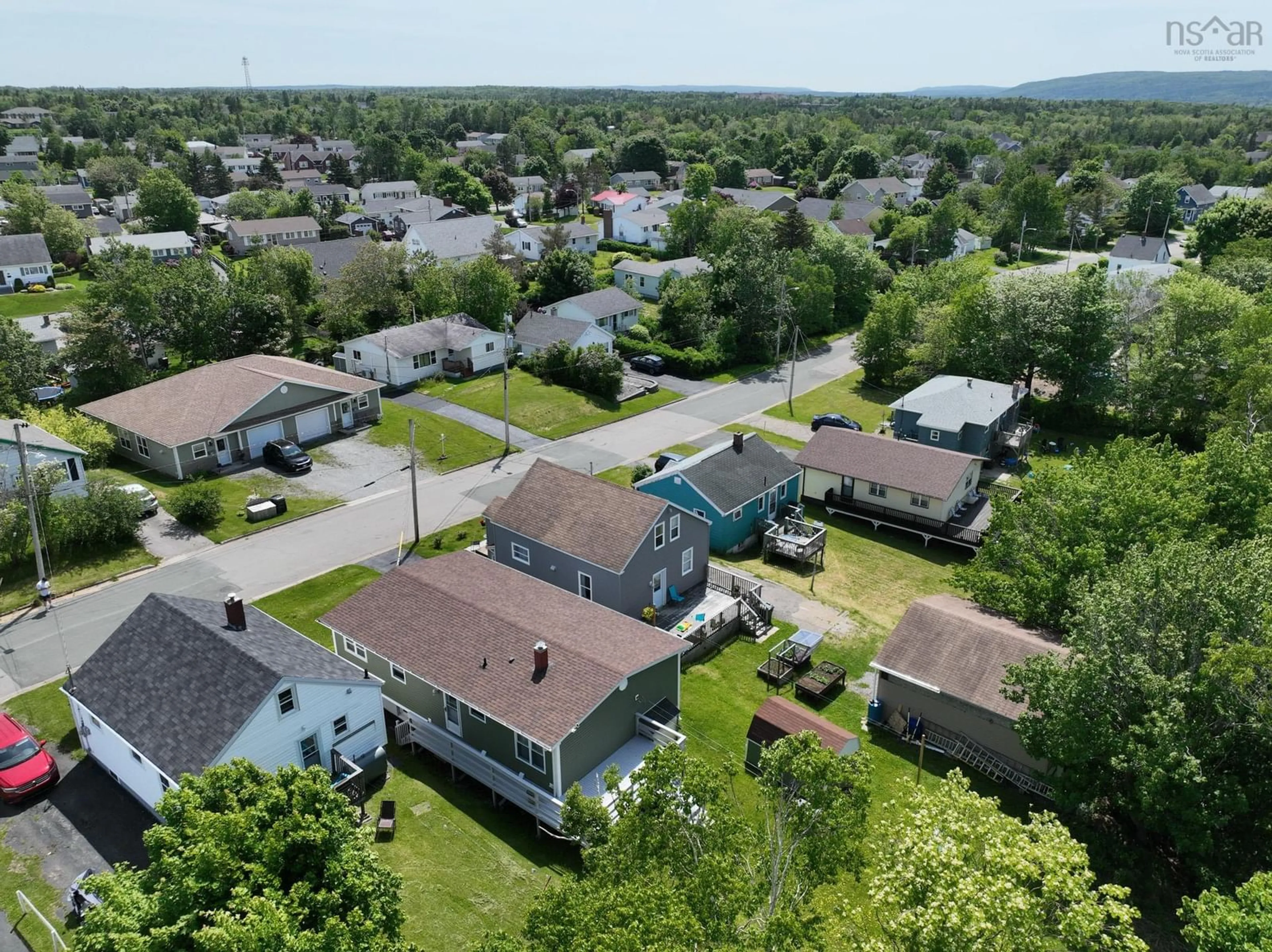 A pic from outside/outdoor area/front of a property/back of a property/a pic from drone, street for 77 Brown St, Sydney Nova Scotia B1S 2M6
