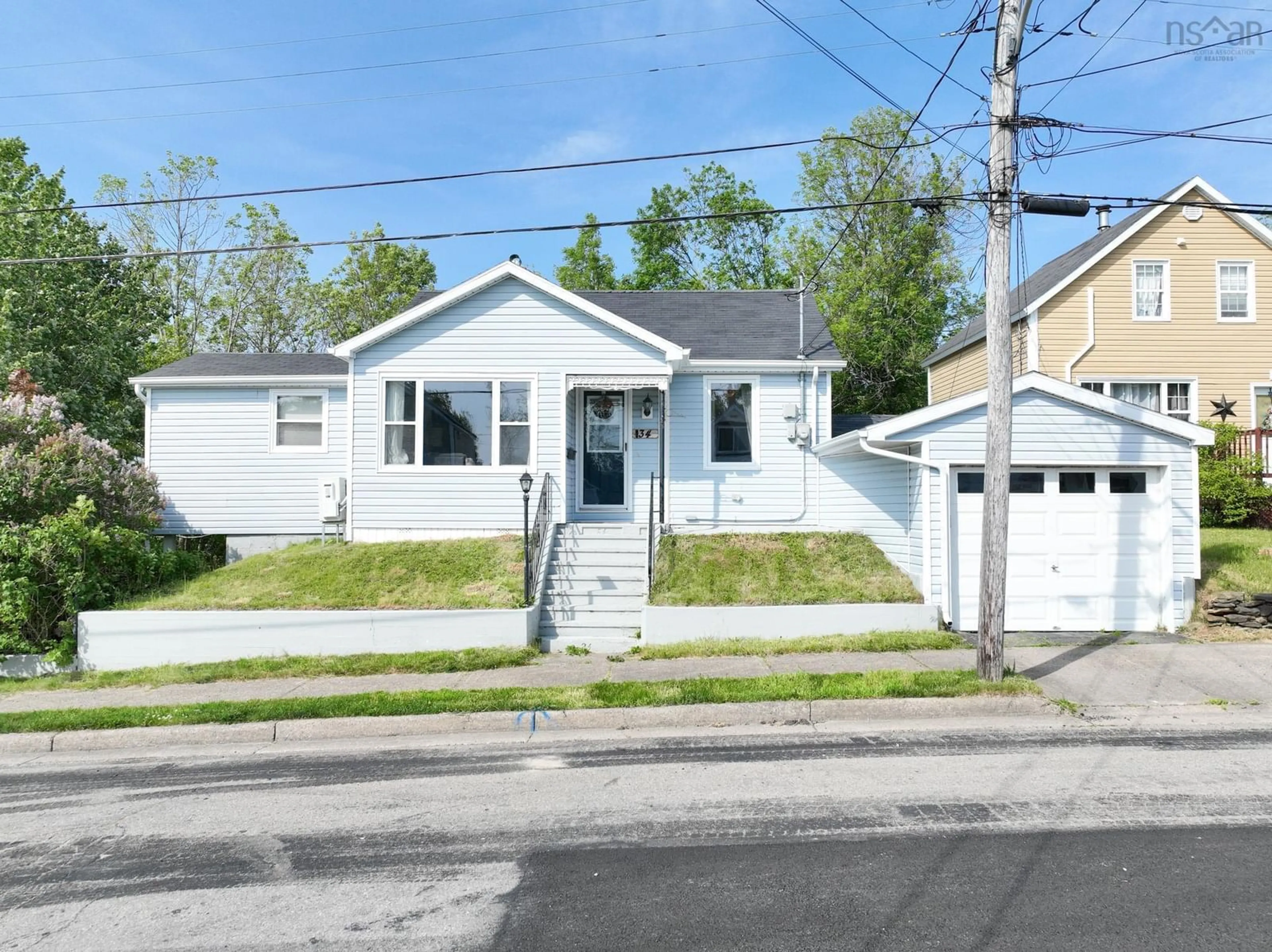 Home with vinyl exterior material, street for 34 Thomas St, Sydney Nova Scotia B1S 2R3