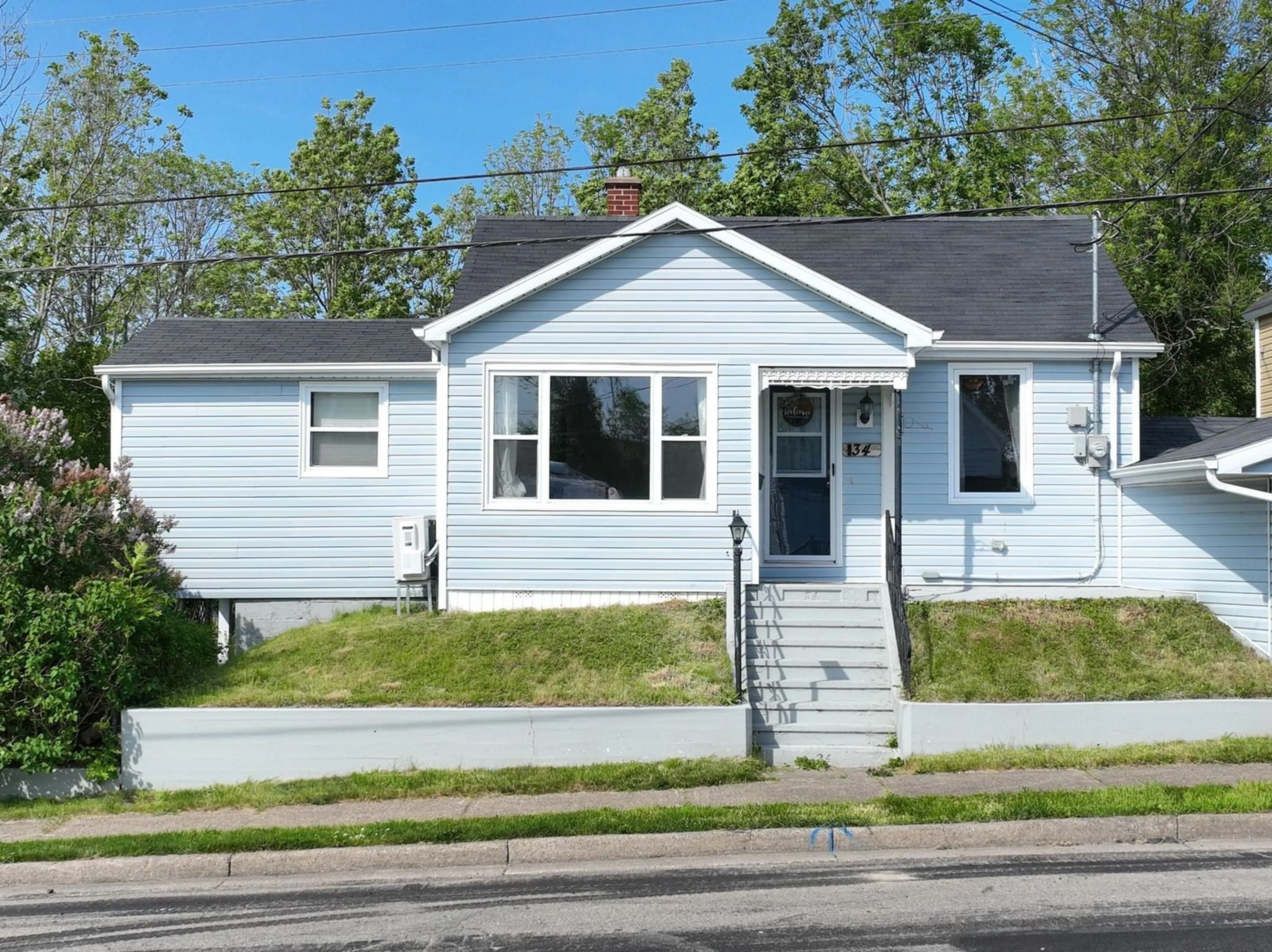 Home with vinyl exterior material, street for 34 Thomas St, Sydney Nova Scotia B1S 2R3
