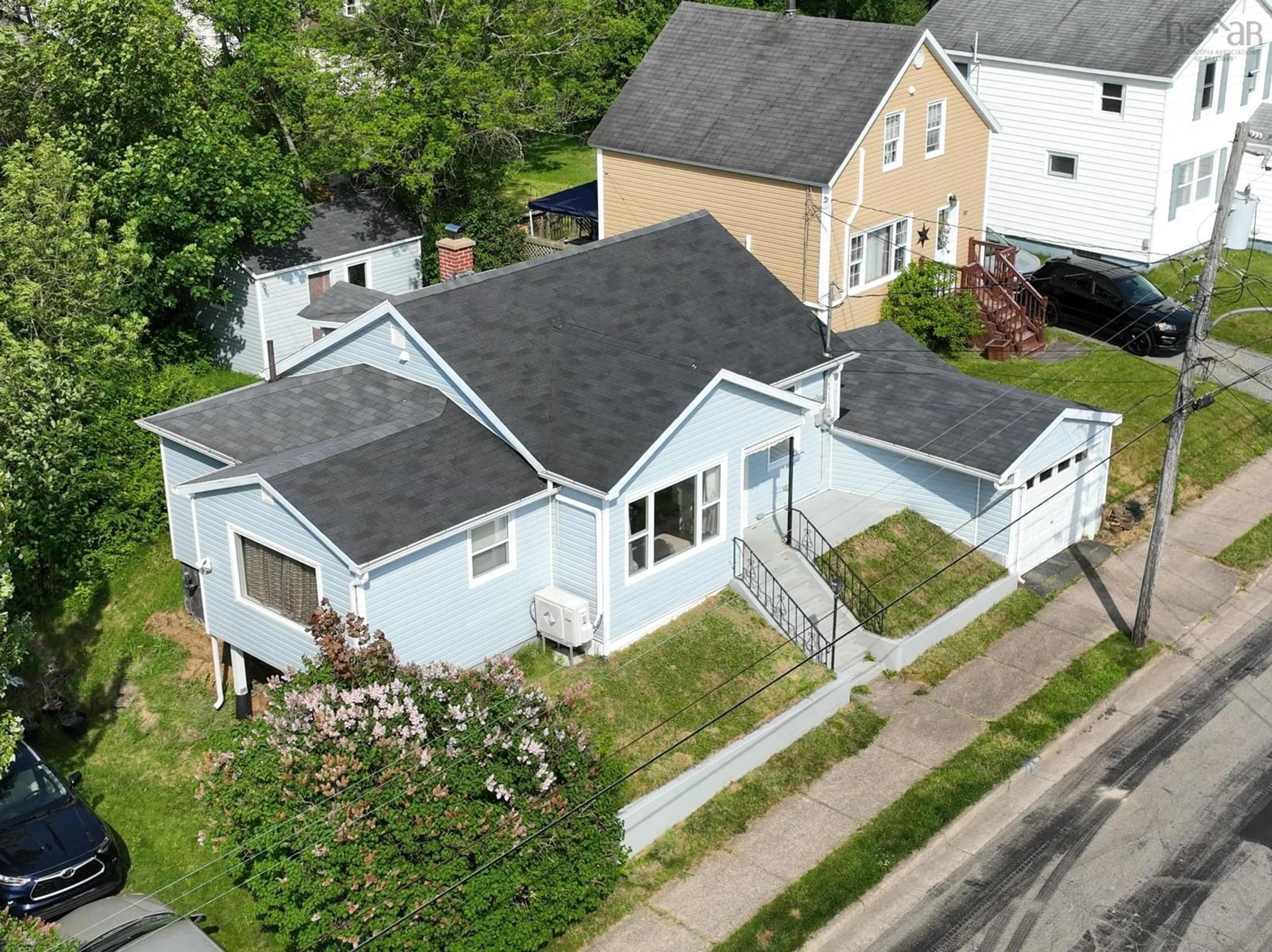 A pic from outside/outdoor area/front of a property/back of a property/a pic from drone, street for 34 Thomas St, Sydney Nova Scotia B1S 2R3