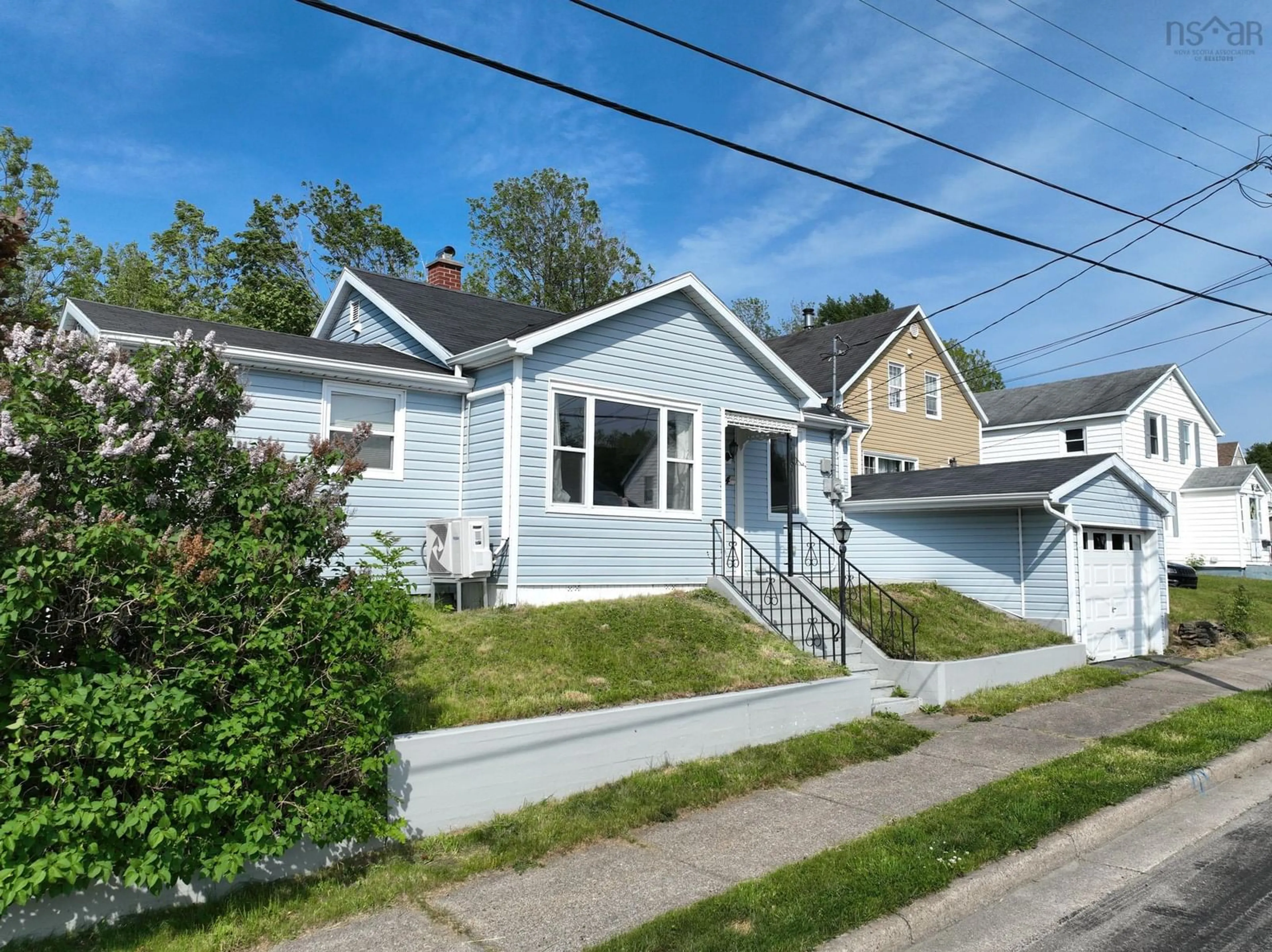 Home with vinyl exterior material, street for 34 Thomas St, Sydney Nova Scotia B1S 2R3