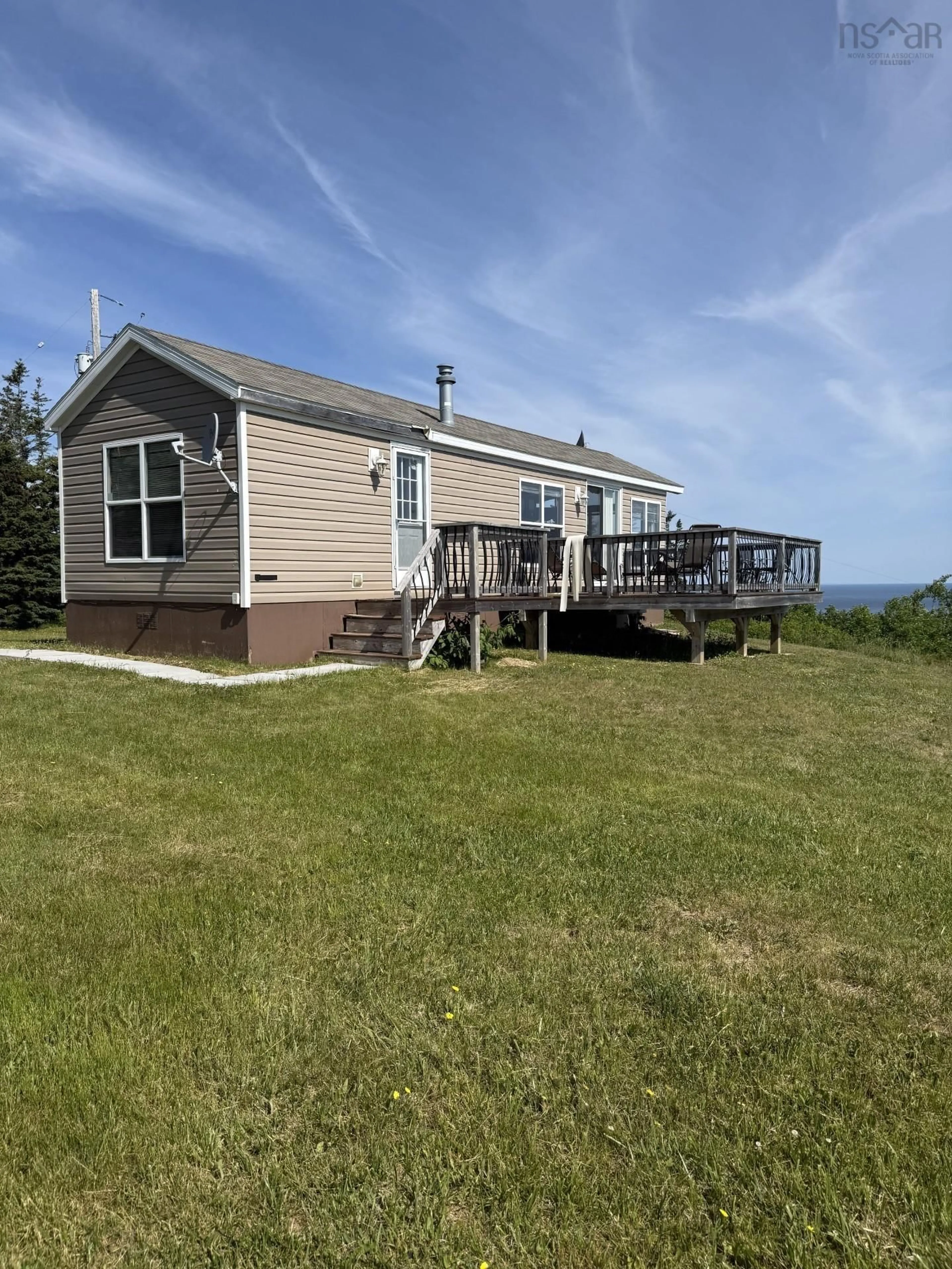 A pic from outside/outdoor area/front of a property/back of a property/a pic from drone, water/lake/river/ocean view for 7047 Highway 337 Cape George Point, Cape George Point Nova Scotia B2G 2L2