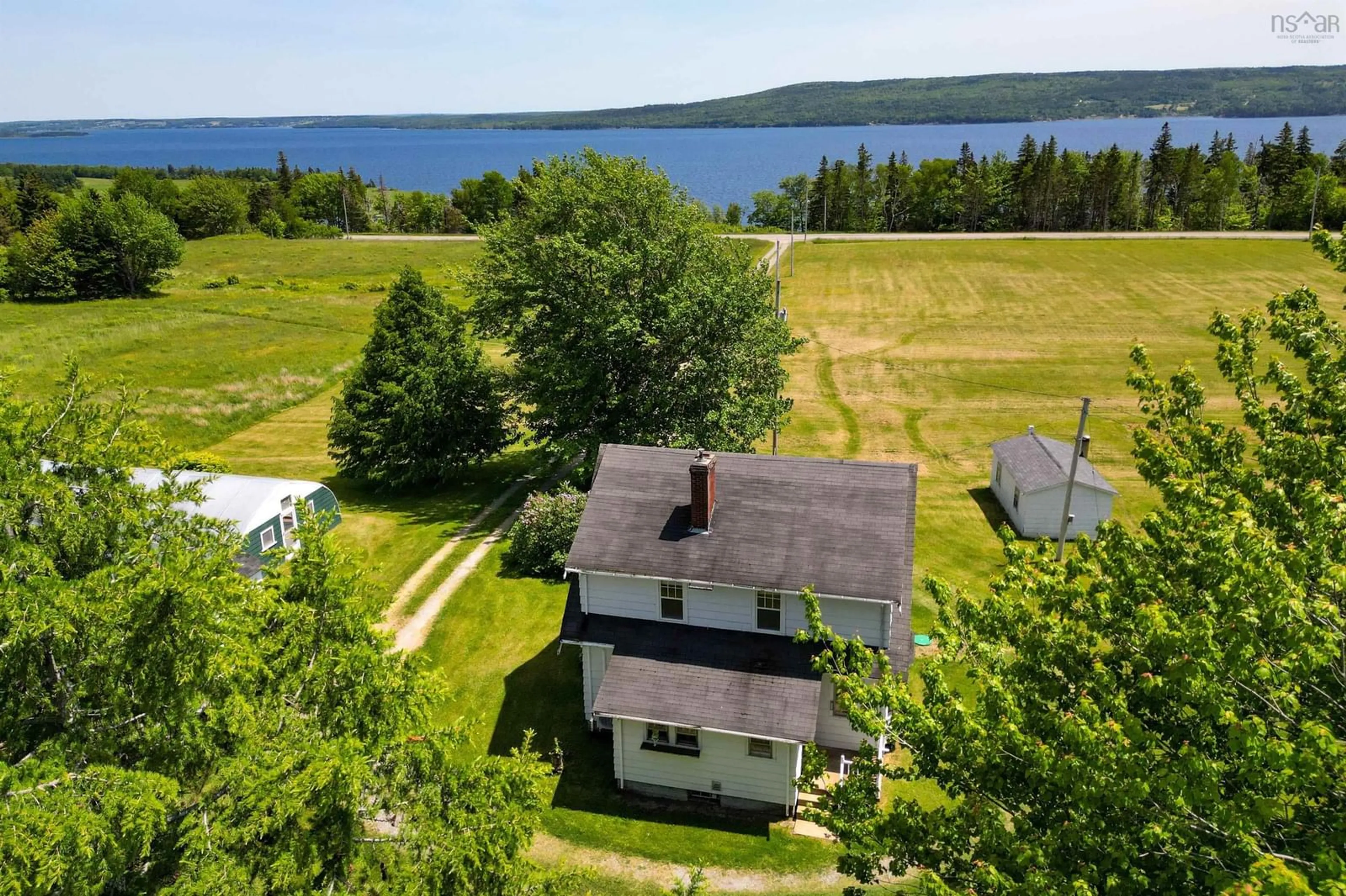 A pic from outside/outdoor area/front of a property/back of a property/a pic from drone, water/lake/river/ocean view for 2438 Hillside Boularderie, Southside Boularderie Nova Scotia B1Y 2S5