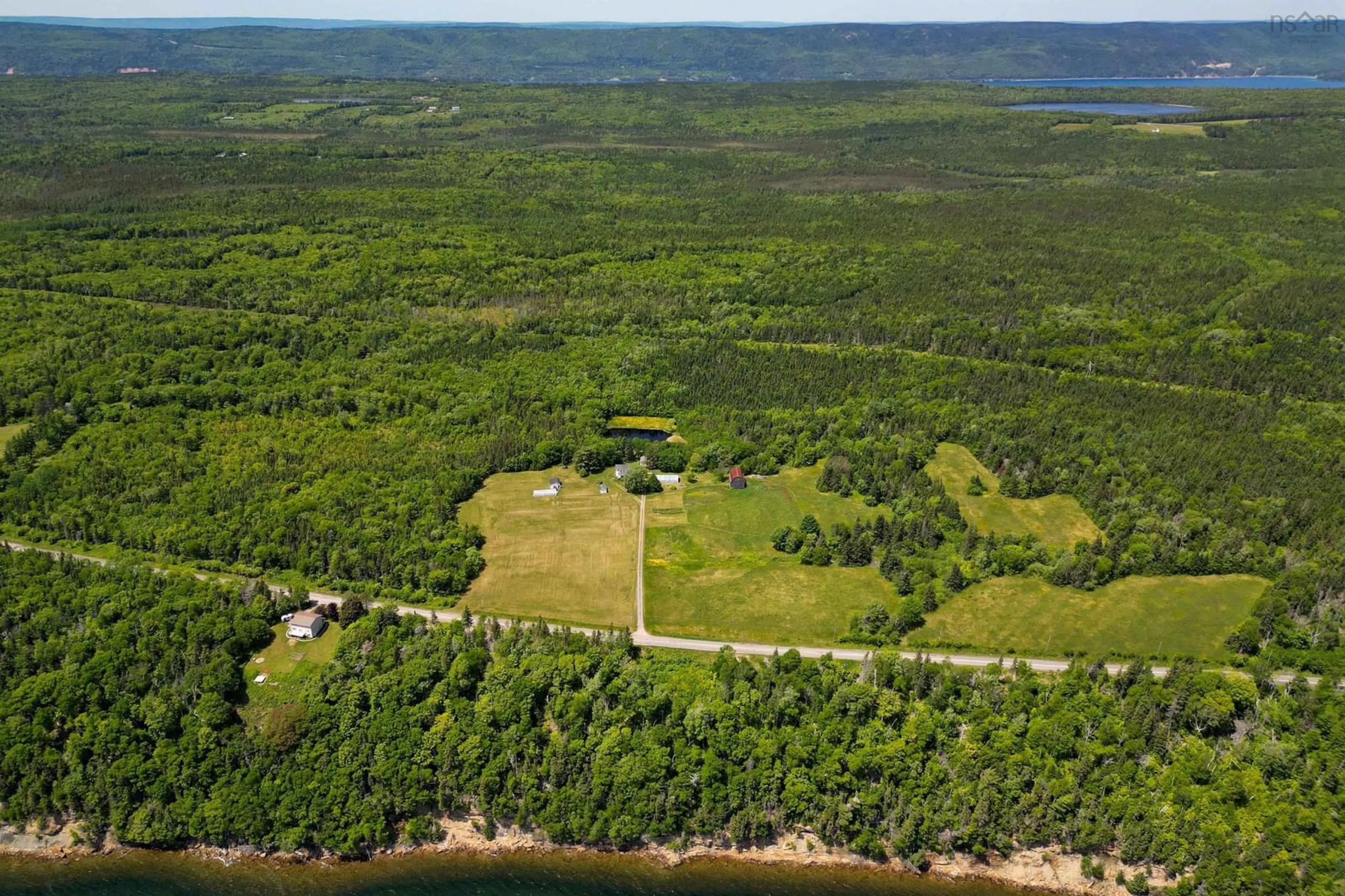 A pic from outside/outdoor area/front of a property/back of a property/a pic from drone, water/lake/river/ocean view for 2438 Hillside Boularderie, Southside Boularderie Nova Scotia B1Y 2S5