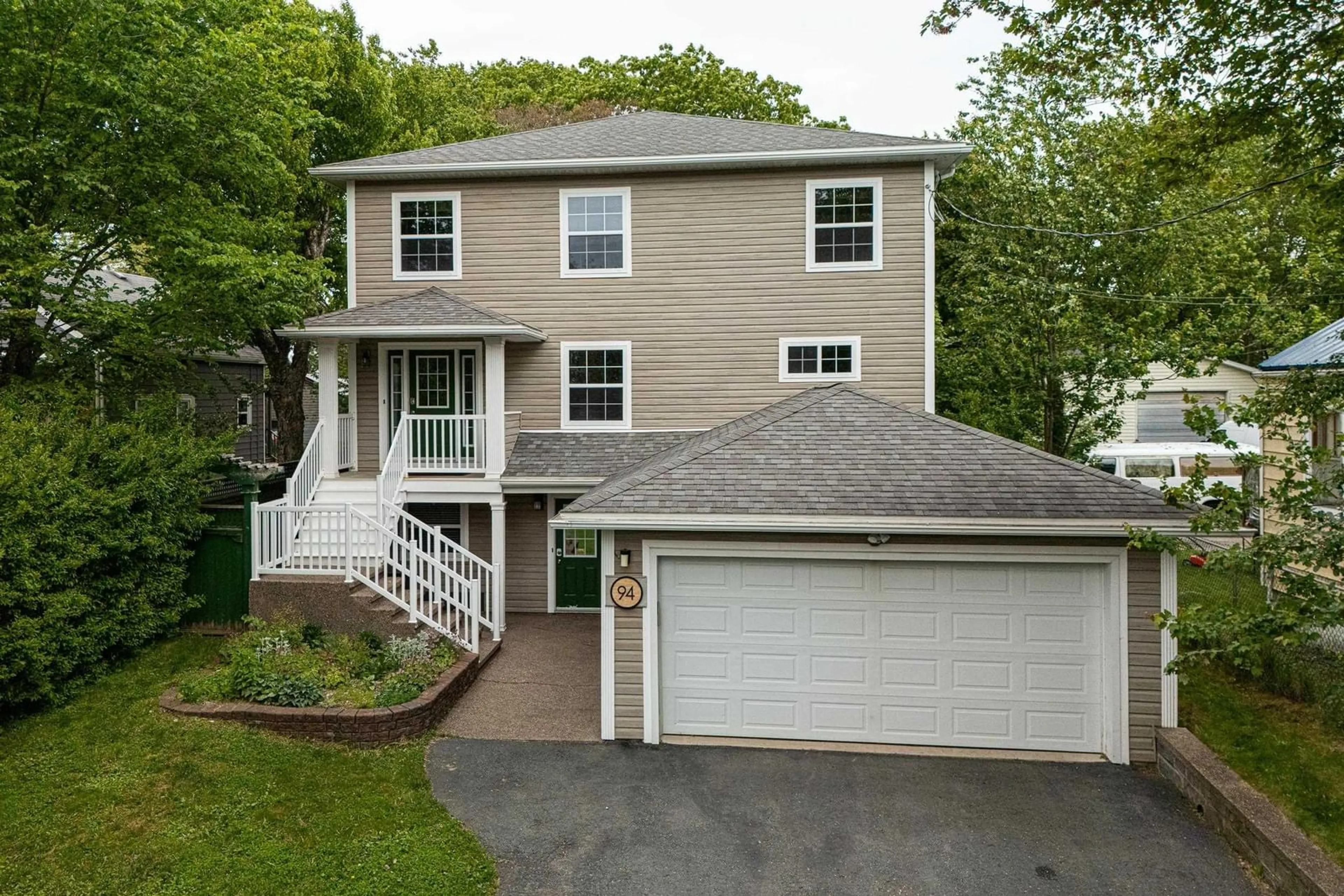 Home with vinyl exterior material, street for 94 Herring Cove Rd, Halifax Nova Scotia B3P 1K4