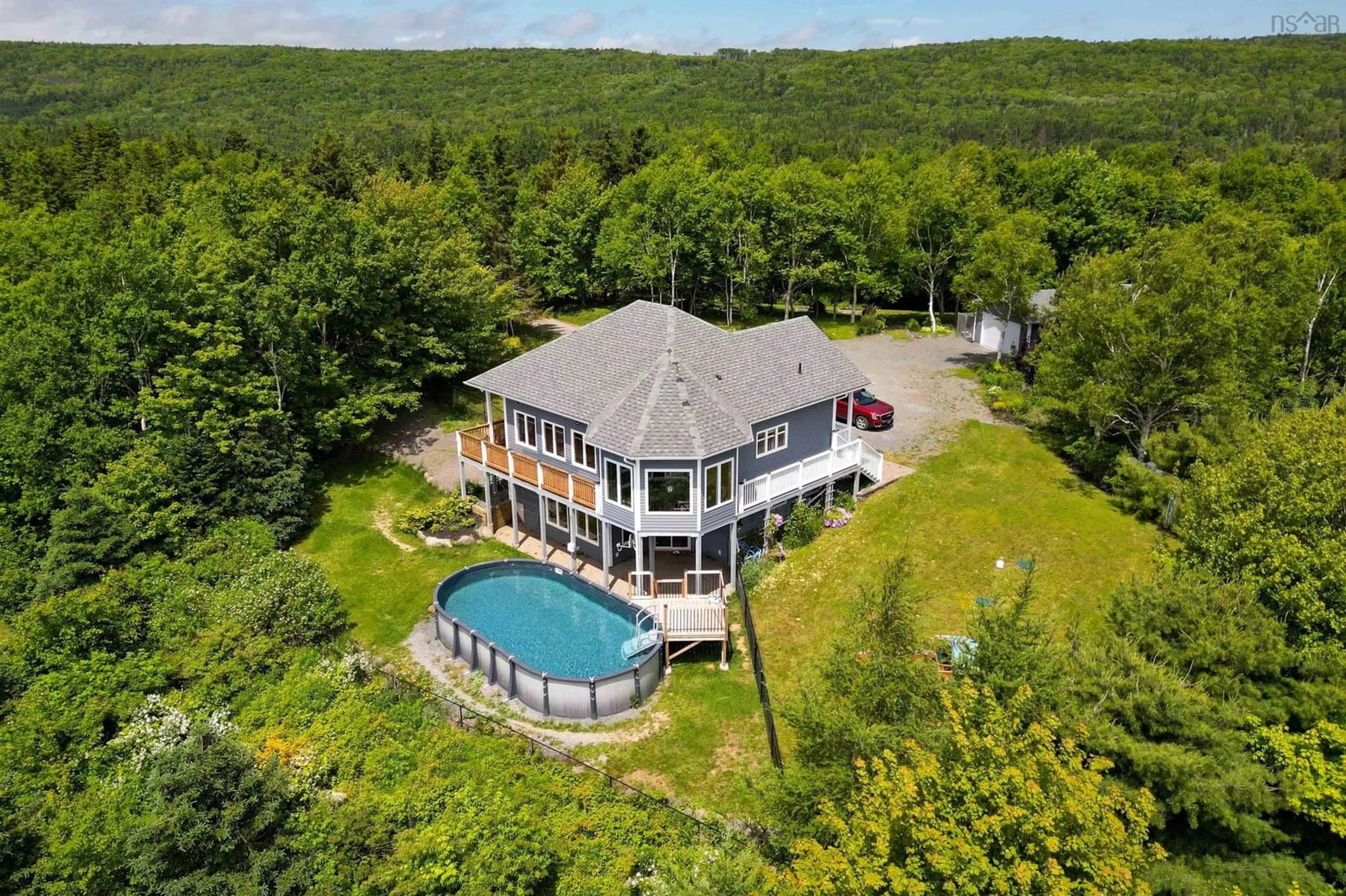 A pic from outside/outdoor area/front of a property/back of a property/a pic from drone, water/lake/river/ocean view for 139 Loch Bhreagh Lane, Northside East Bay Nova Scotia B1J 0A4