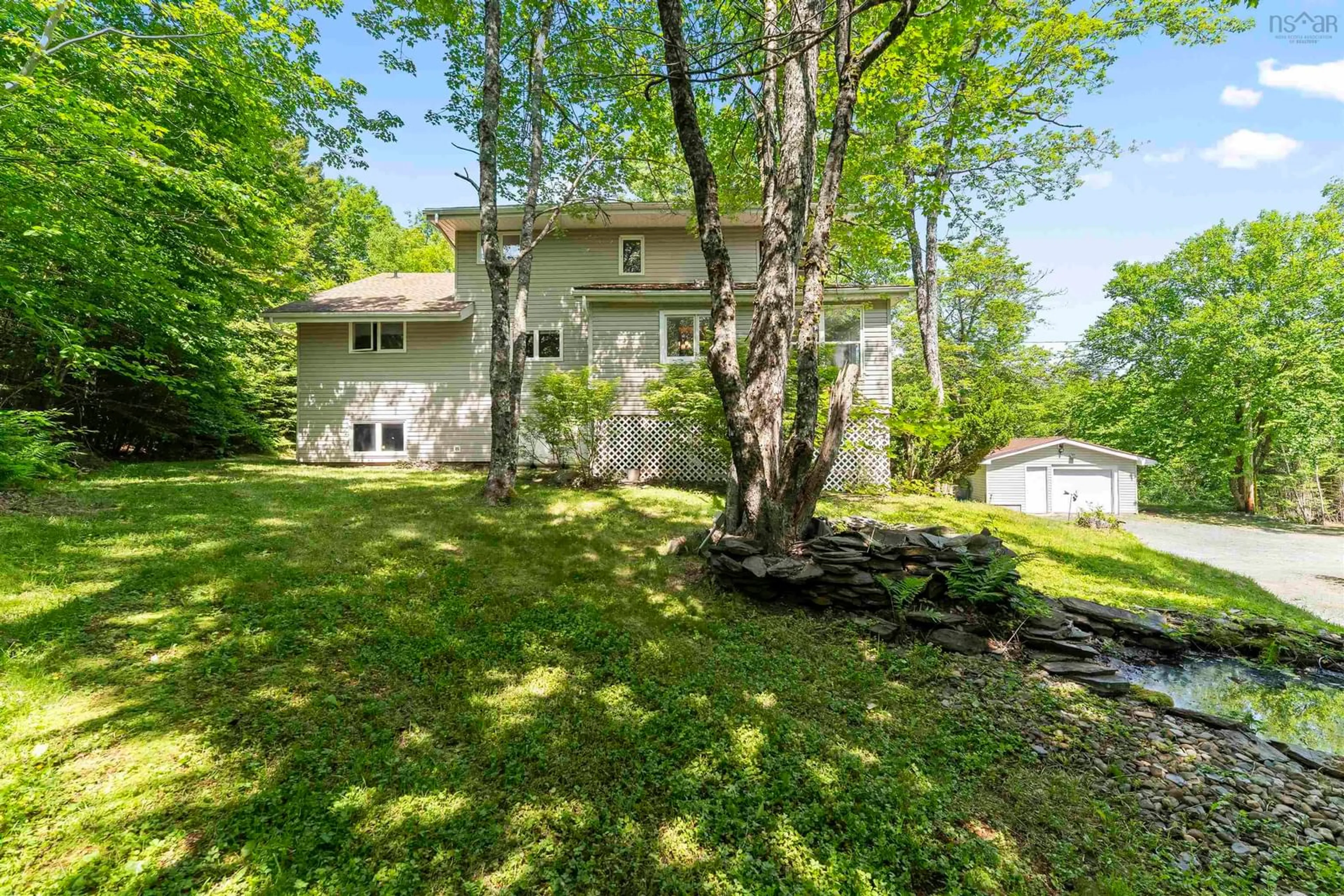 A pic from outside/outdoor area/front of a property/back of a property/a pic from drone, water/lake/river/ocean view for 518 Lakeview Ave, Middle Sackville Nova Scotia B4E 3B6