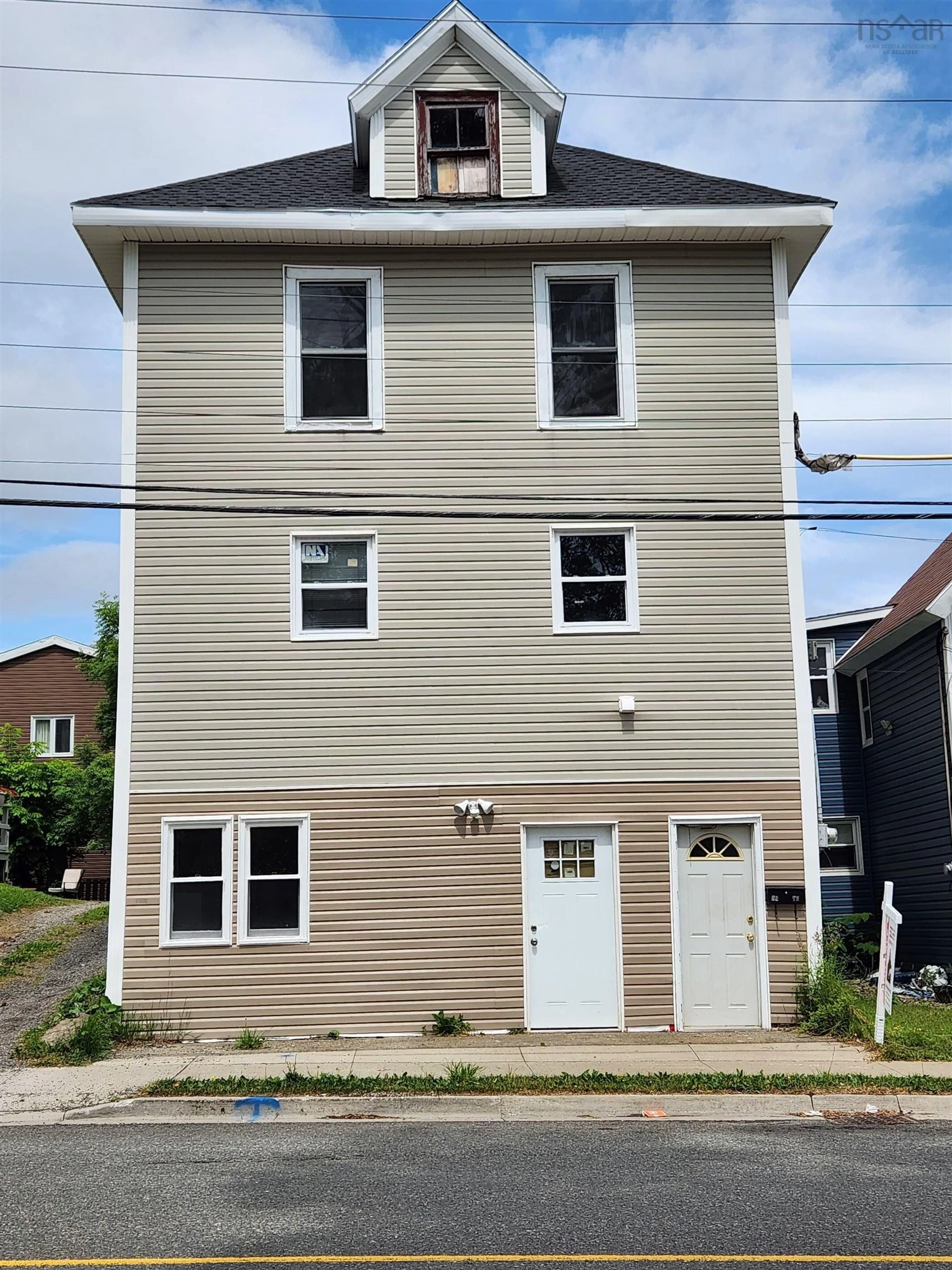 Home with vinyl exterior material, street for 17 Ferry St, Cape Breton Island Nova Scotia B1P 5Z9