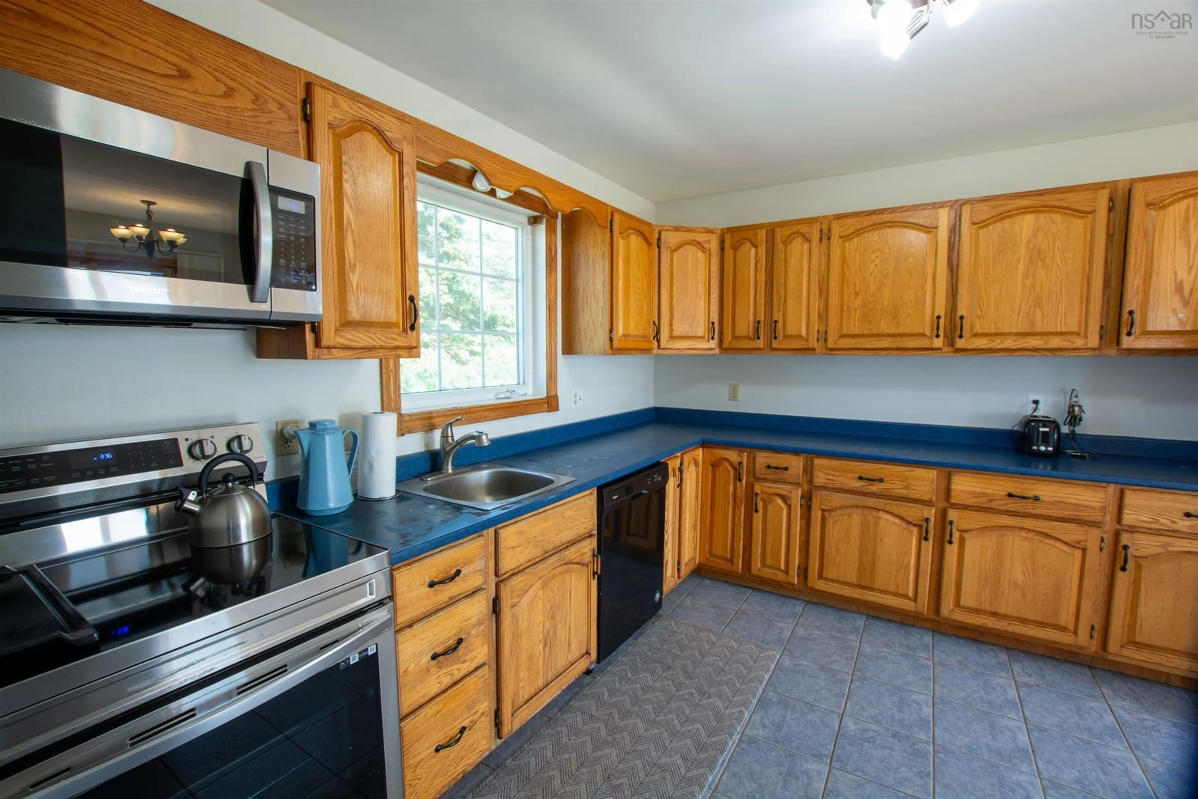 Standard kitchen, ceramic/tile floor for 2815 Main Shore Rd, Port Maitland Nova Scotia B5A 5C4