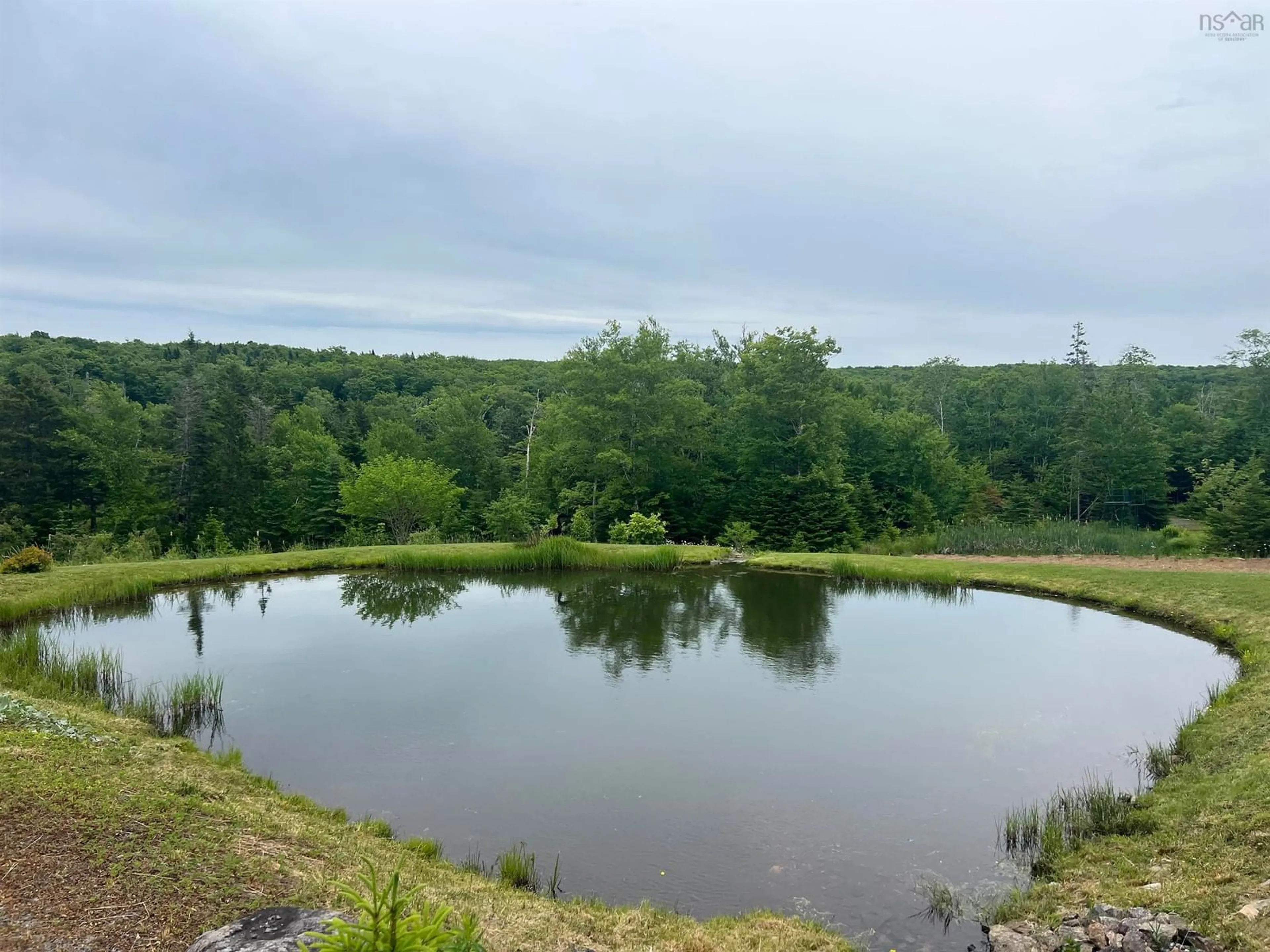 A pic from outside/outdoor area/front of a property/back of a property/a pic from drone, water/lake/river/ocean view for 3504 Highway 311, Nuttby Nova Scotia B6L 6H9