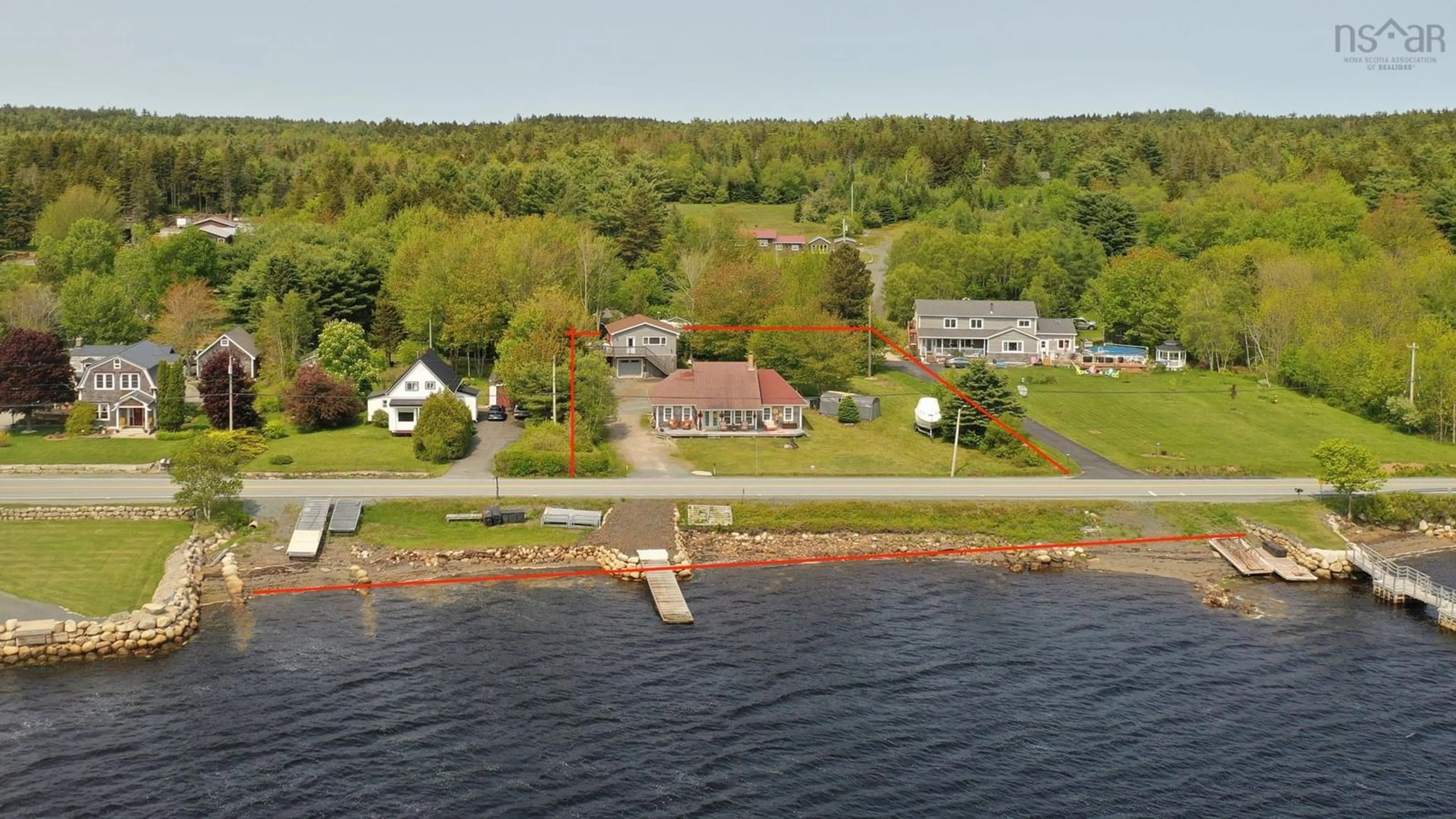 A pic from outside/outdoor area/front of a property/back of a property/a pic from drone, water/lake/river/ocean view for 5070 Highway 332, East Lahave Nova Scotia B4V 0V6