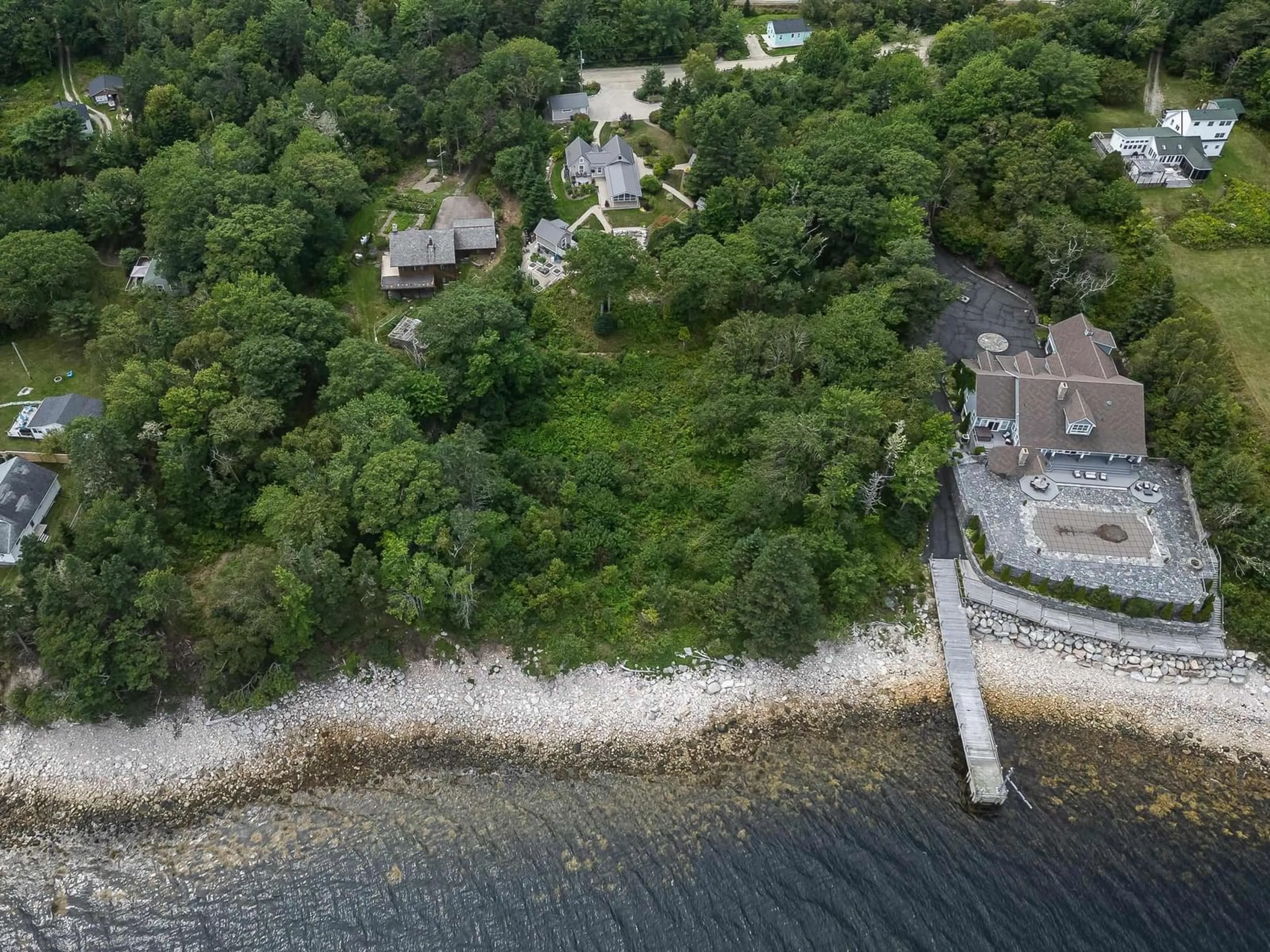 A pic from outside/outdoor area/front of a property/back of a property/a pic from drone, water/lake/river/ocean view for 17 Mill Cove Shore Rd, Mill Cove Nova Scotia B0J 1T0