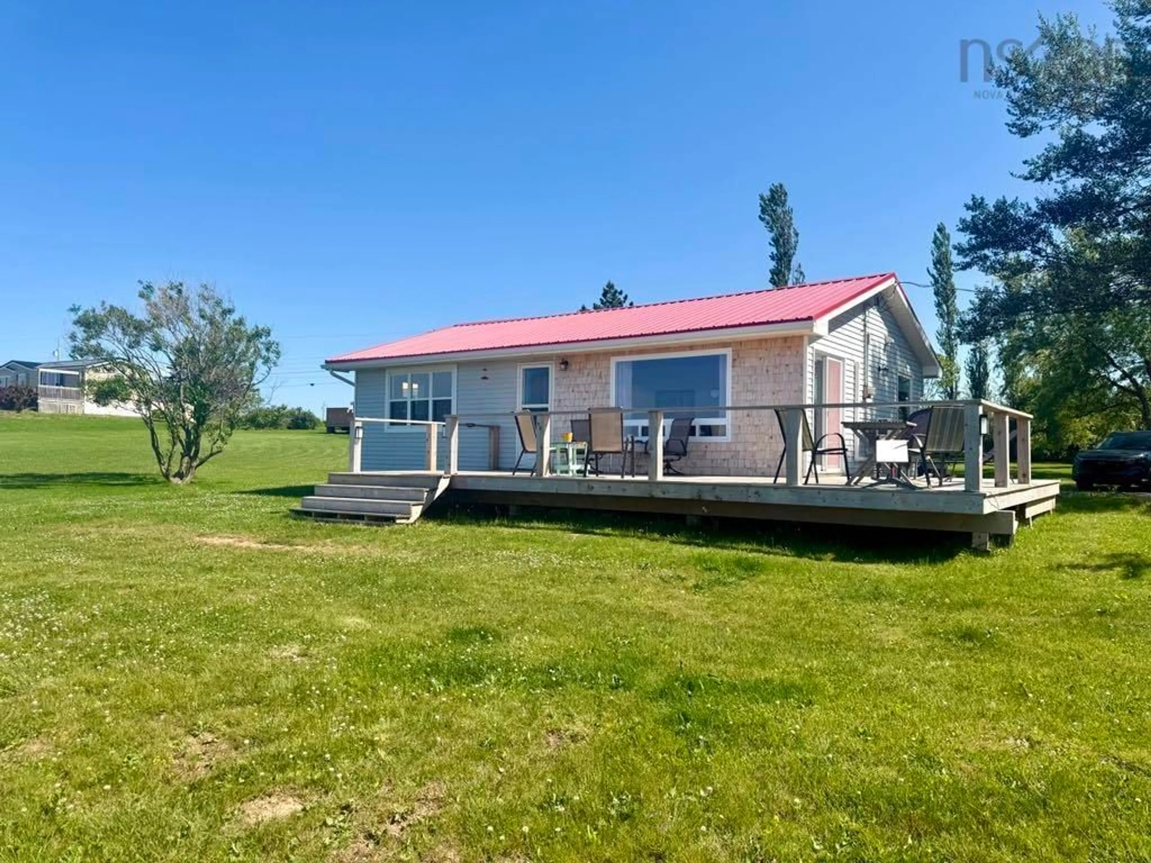 A pic from outside/outdoor area/front of a property/back of a property/a pic from drone, water/lake/river/ocean view for 73 Chambers Lane, Sand Point Nova Scotia B0K 1V0