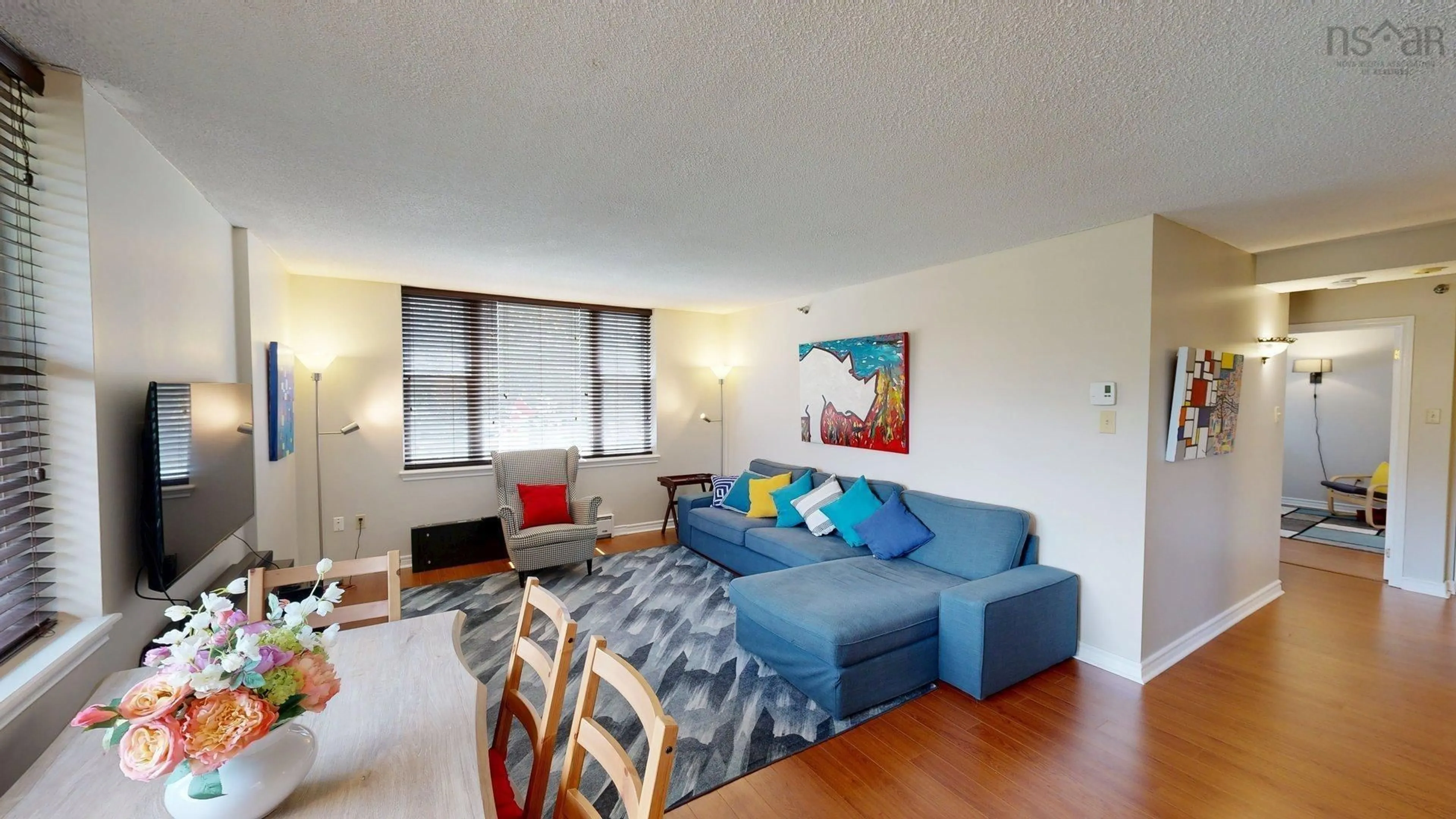 Living room with furniture, wood/laminate floor for 85 Spinnaker Dr #111, Halifax Nova Scotia B3N 3E3