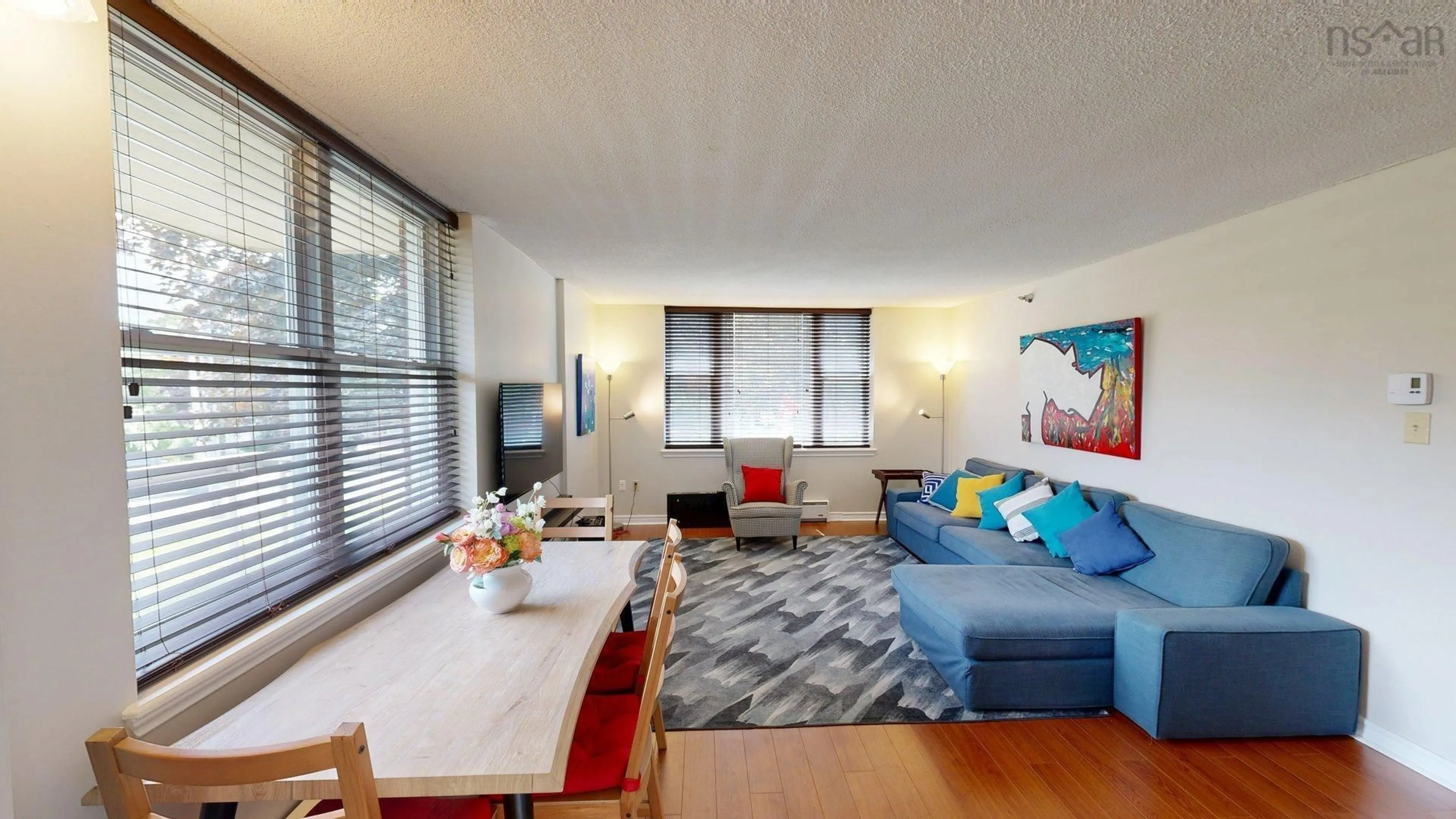 Living room with furniture, wood/laminate floor for 85 Spinnaker Dr #111, Halifax Nova Scotia B3N 3E3