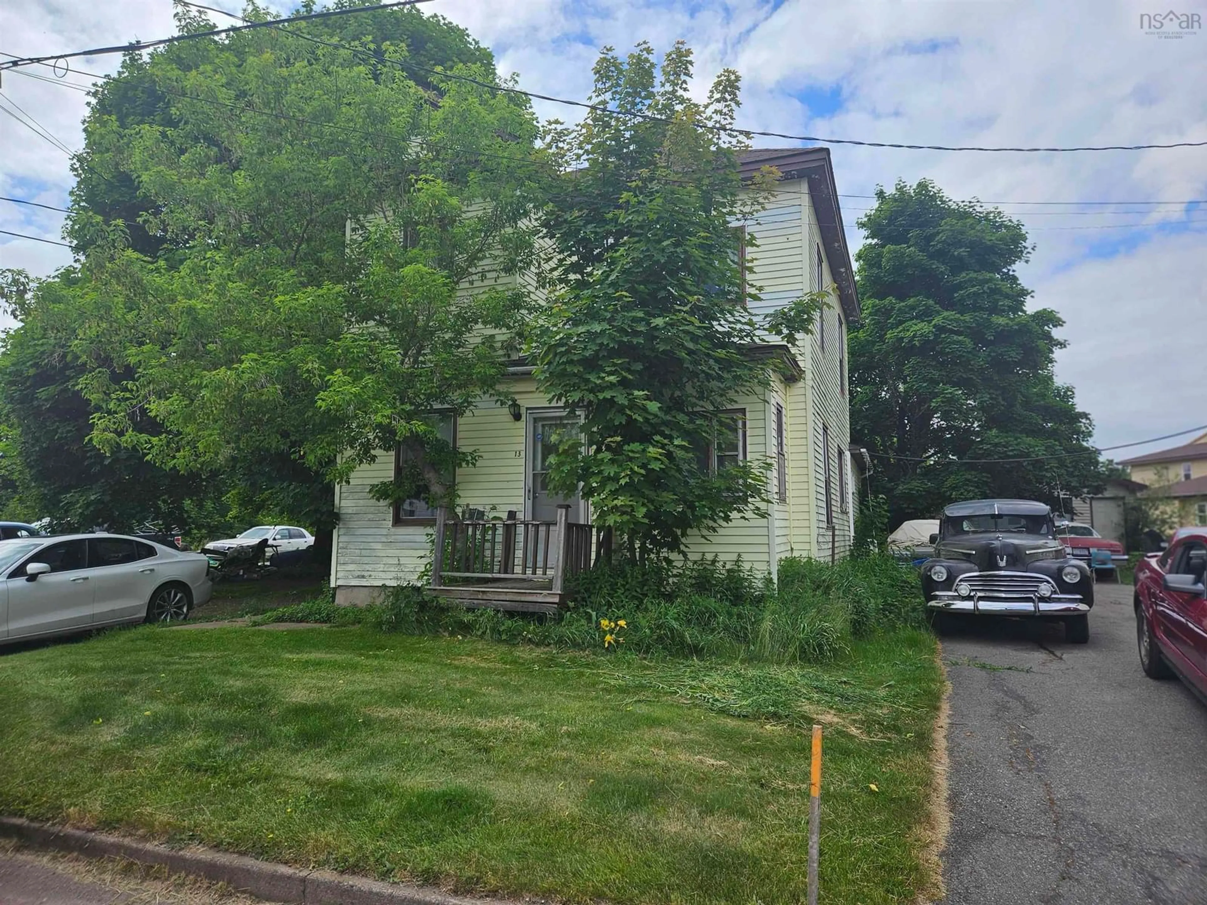 A pic from outside/outdoor area/front of a property/back of a property/a pic from drone, street for 13 Dundonald St, Amherst Nova Scotia B4H 1G8