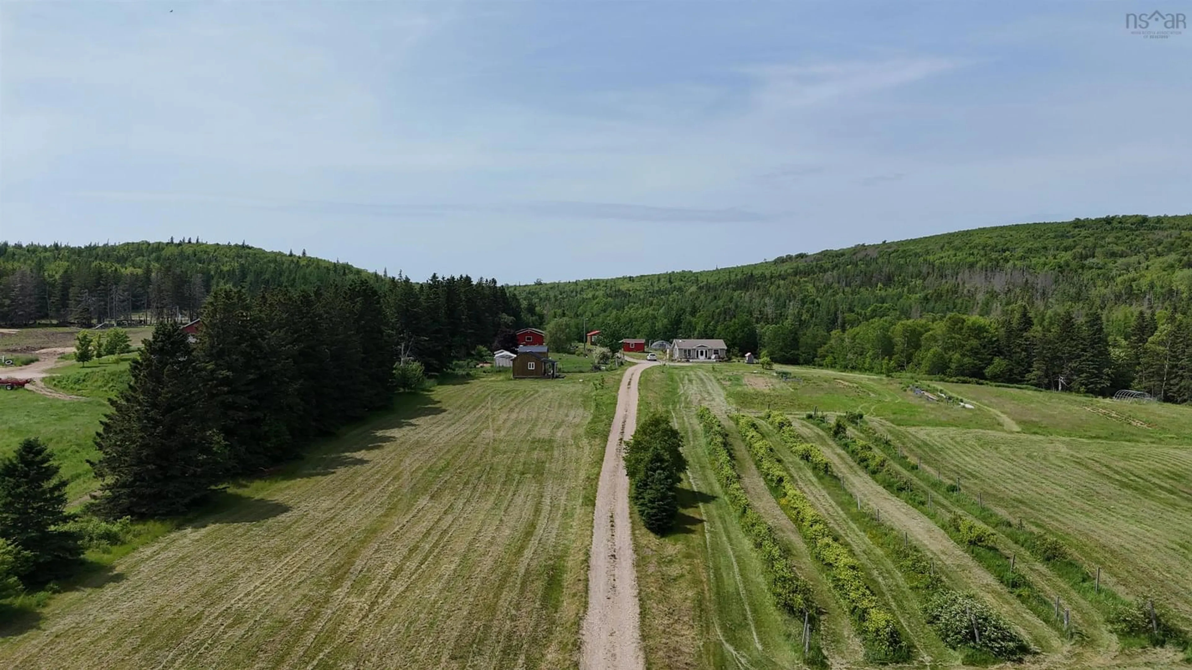 A pic from outside/outdoor area/front of a property/back of a property/a pic from drone, unknown for 3512 Highway 252, Brook Village Nova Scotia B0E 1X0