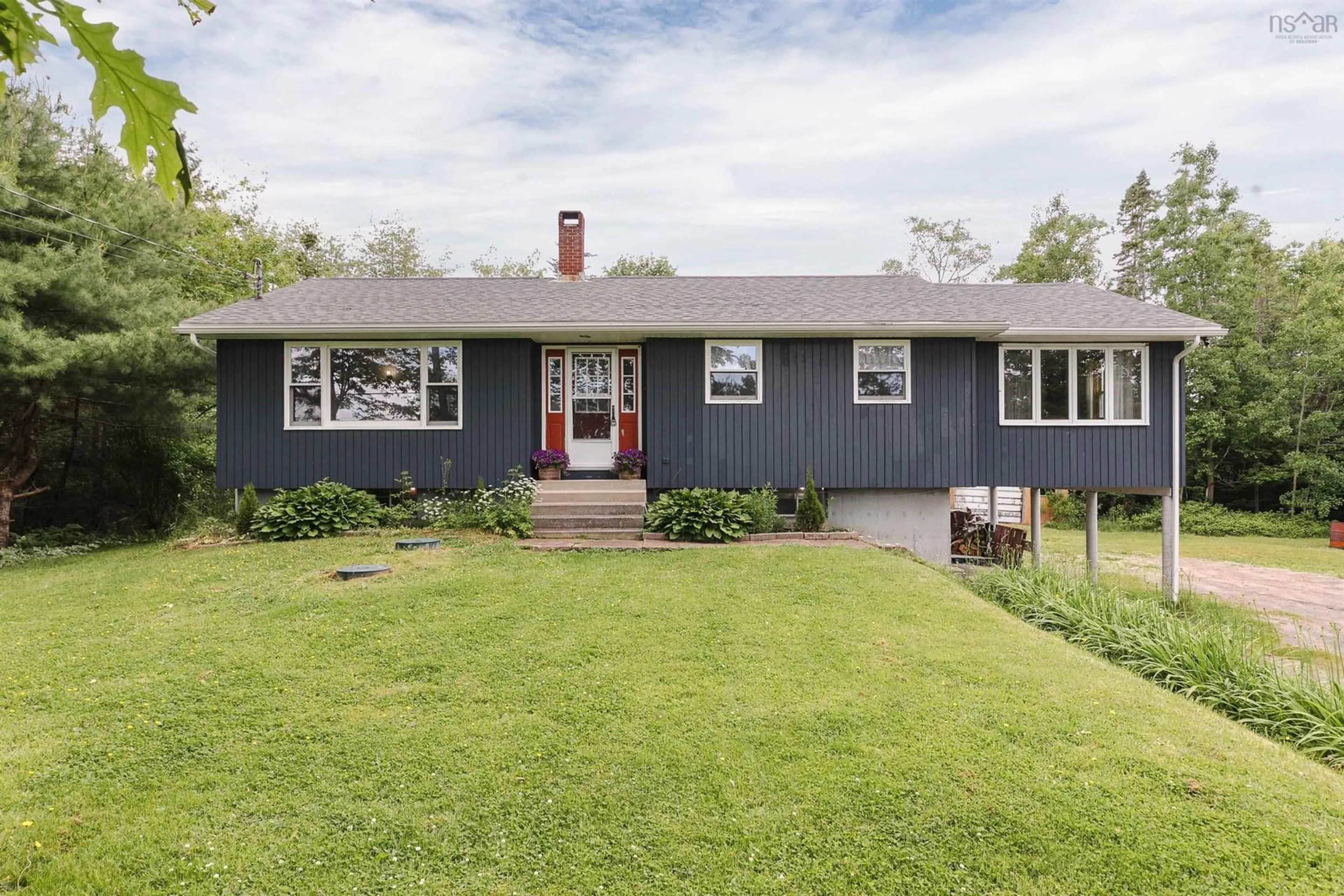 Home with vinyl exterior material, street for 326 Highway 3, Simms Settlement Nova Scotia B0J 1T0