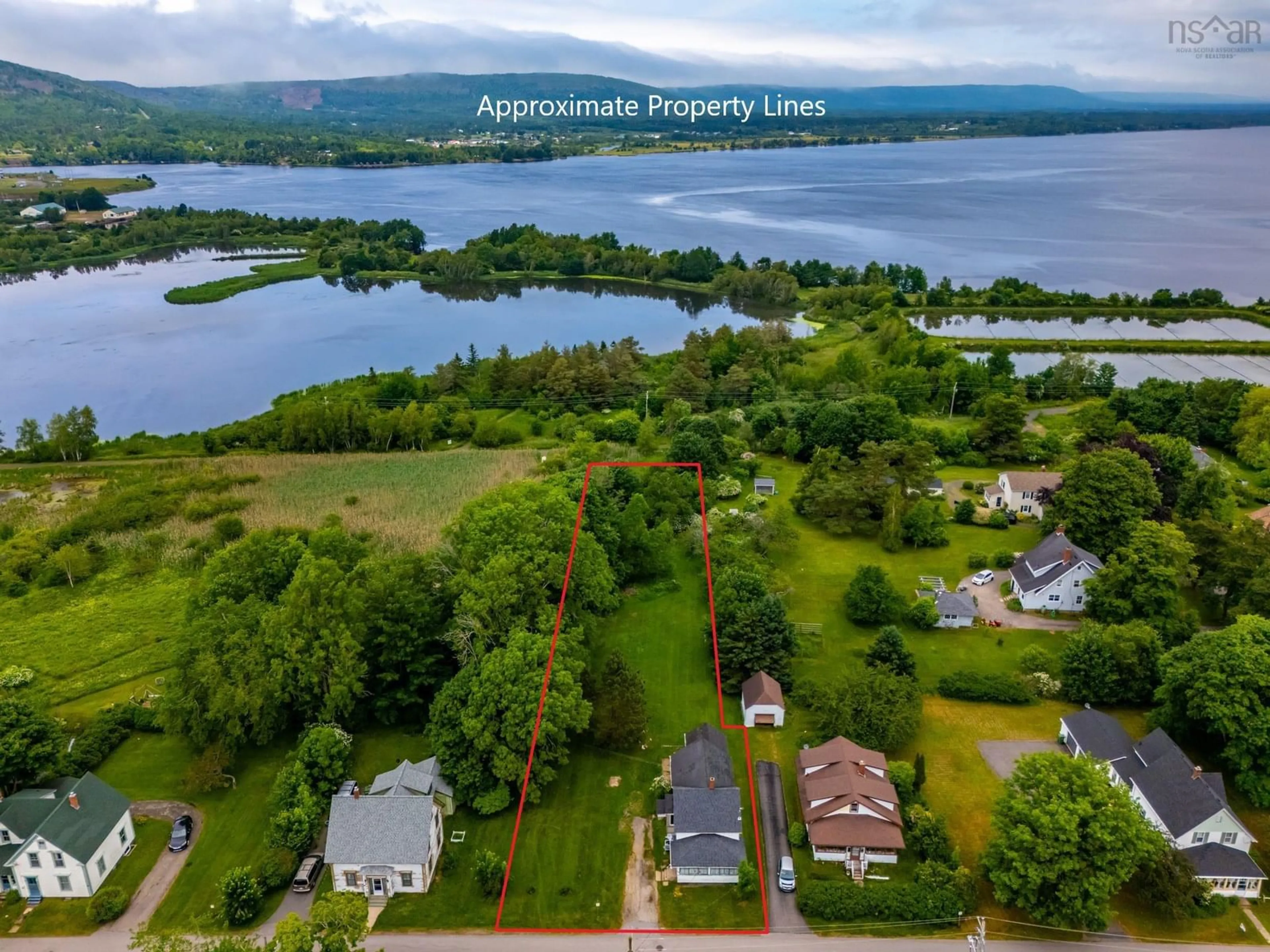 A pic from outside/outdoor area/front of a property/back of a property/a pic from drone, water/lake/river/ocean view for 148 Ritchie St, Annapolis Royal Nova Scotia B0S 1A0