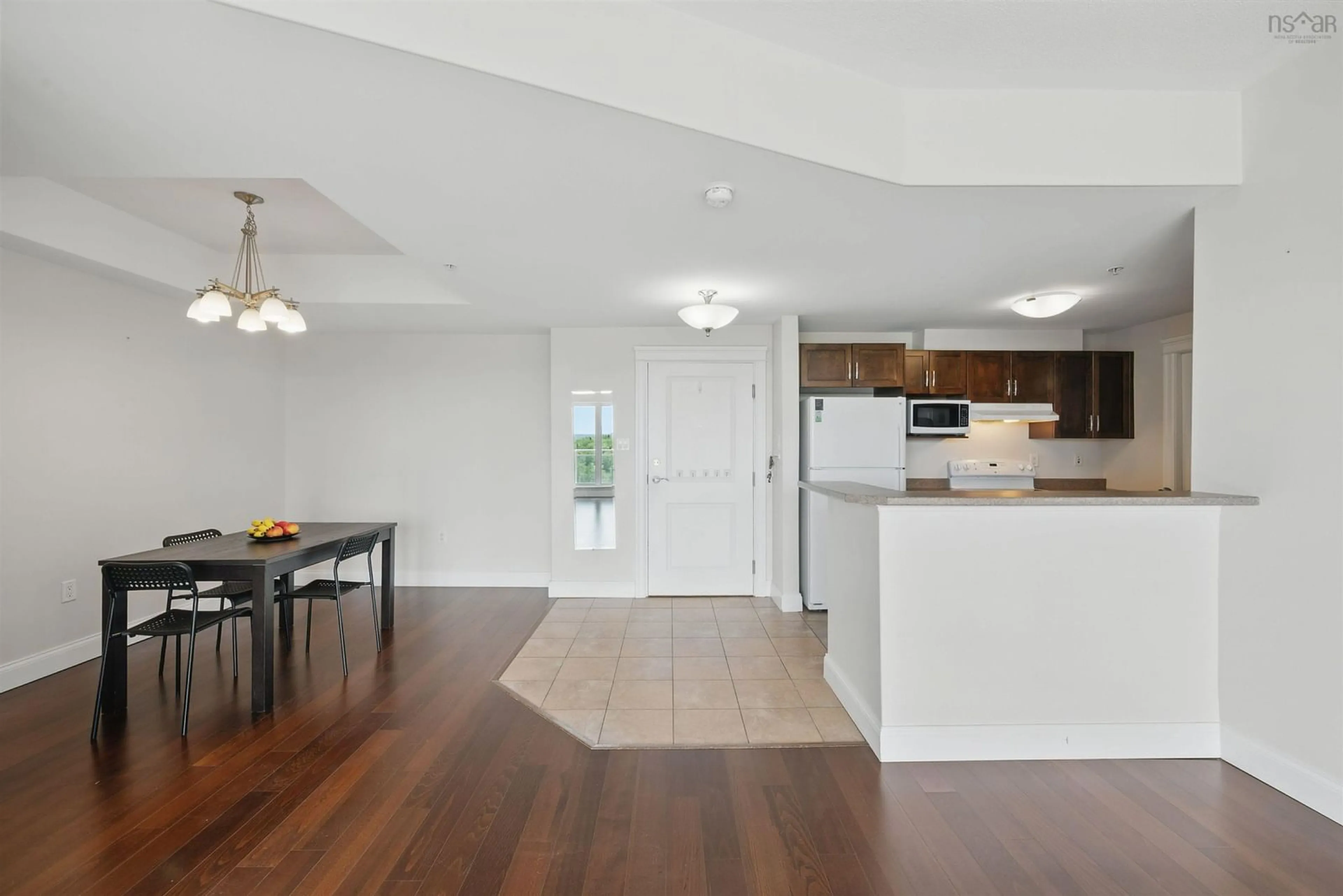 Open concept kitchen, wood/laminate floor for 60 Walter Havill Dr #307, Halifax Nova Scotia B3N 0A9