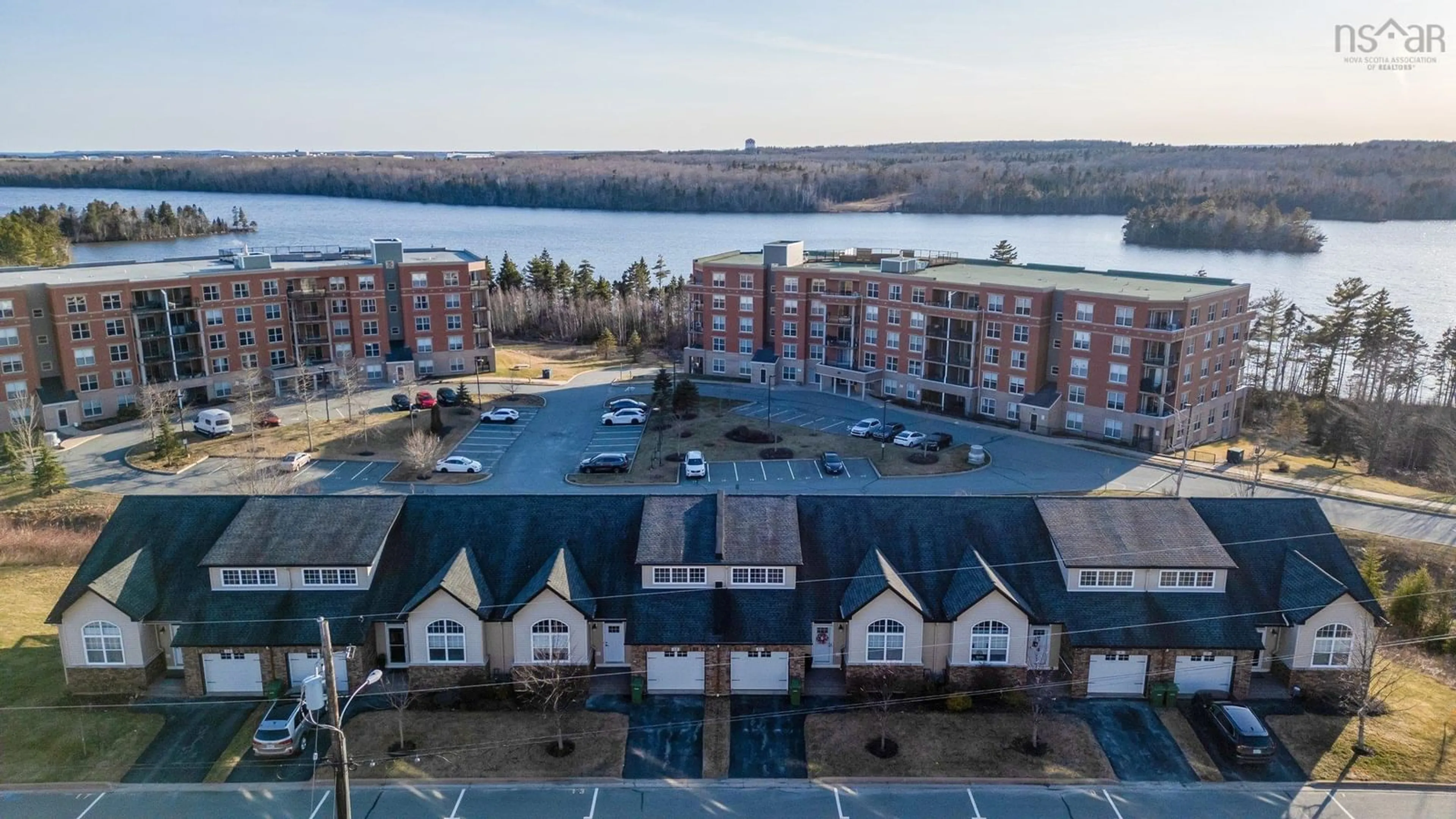 A pic from outside/outdoor area/front of a property/back of a property/a pic from drone, water/lake/river/ocean view for 13 Aquavista Lane, Dartmouth Nova Scotia B2W 0K5