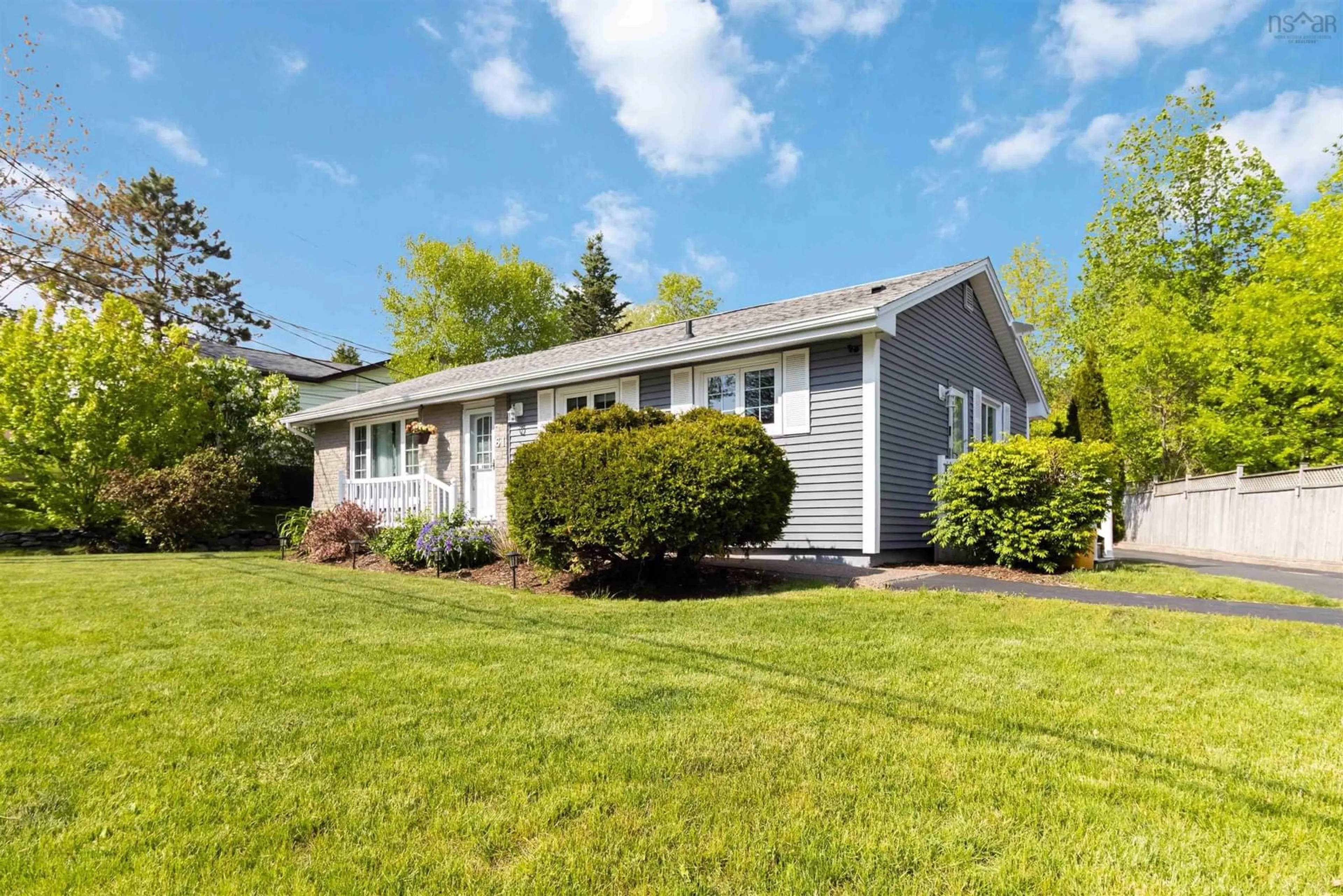 Home with vinyl exterior material, street for 61 Hillcrest Avenue, Lower Sackville Nova Scotia B4C 1X2
