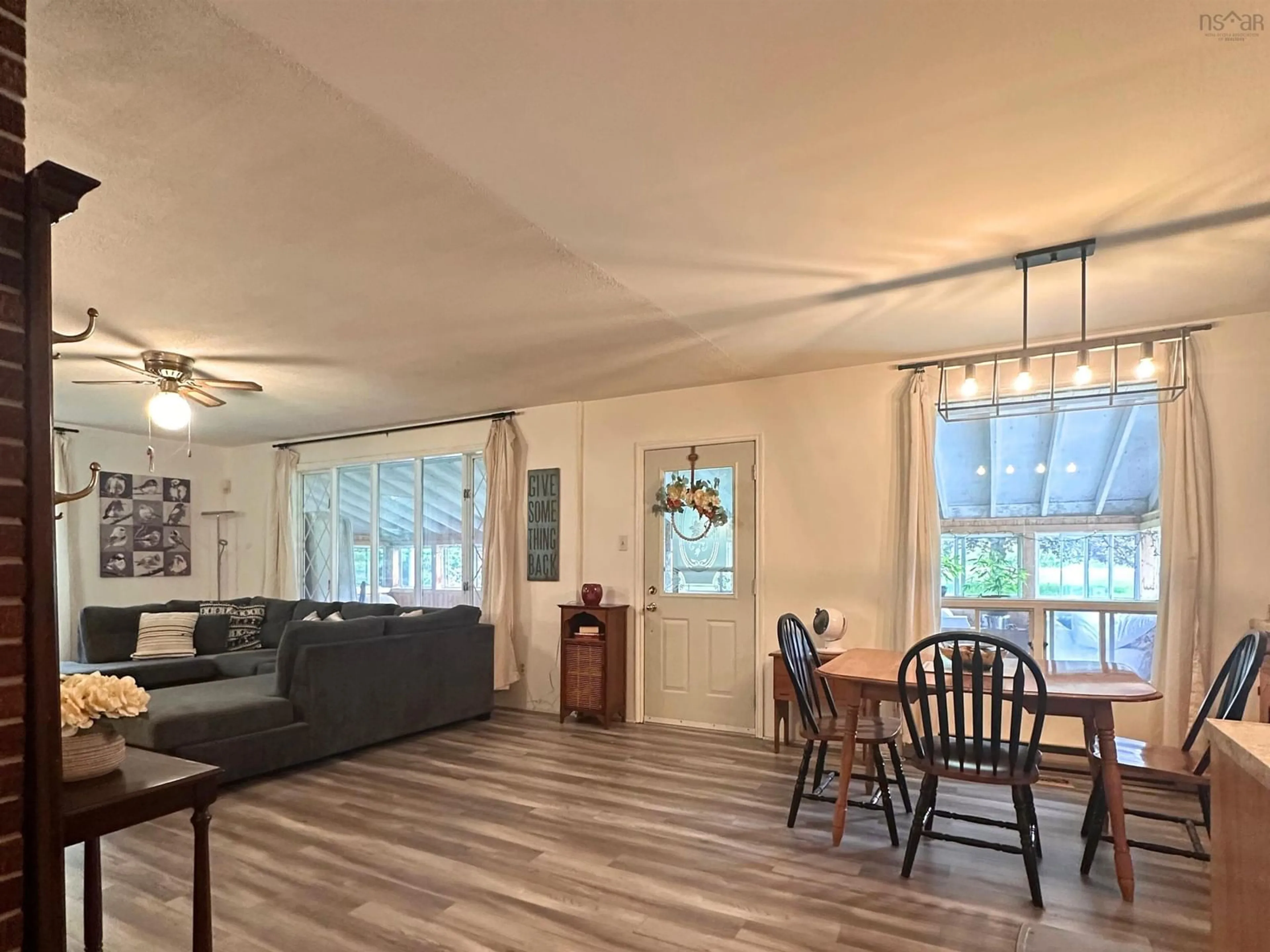 Living room with furniture, wood/laminate floor for 5662 Highway 325, West Clifford Nova Scotia B4V 8G8