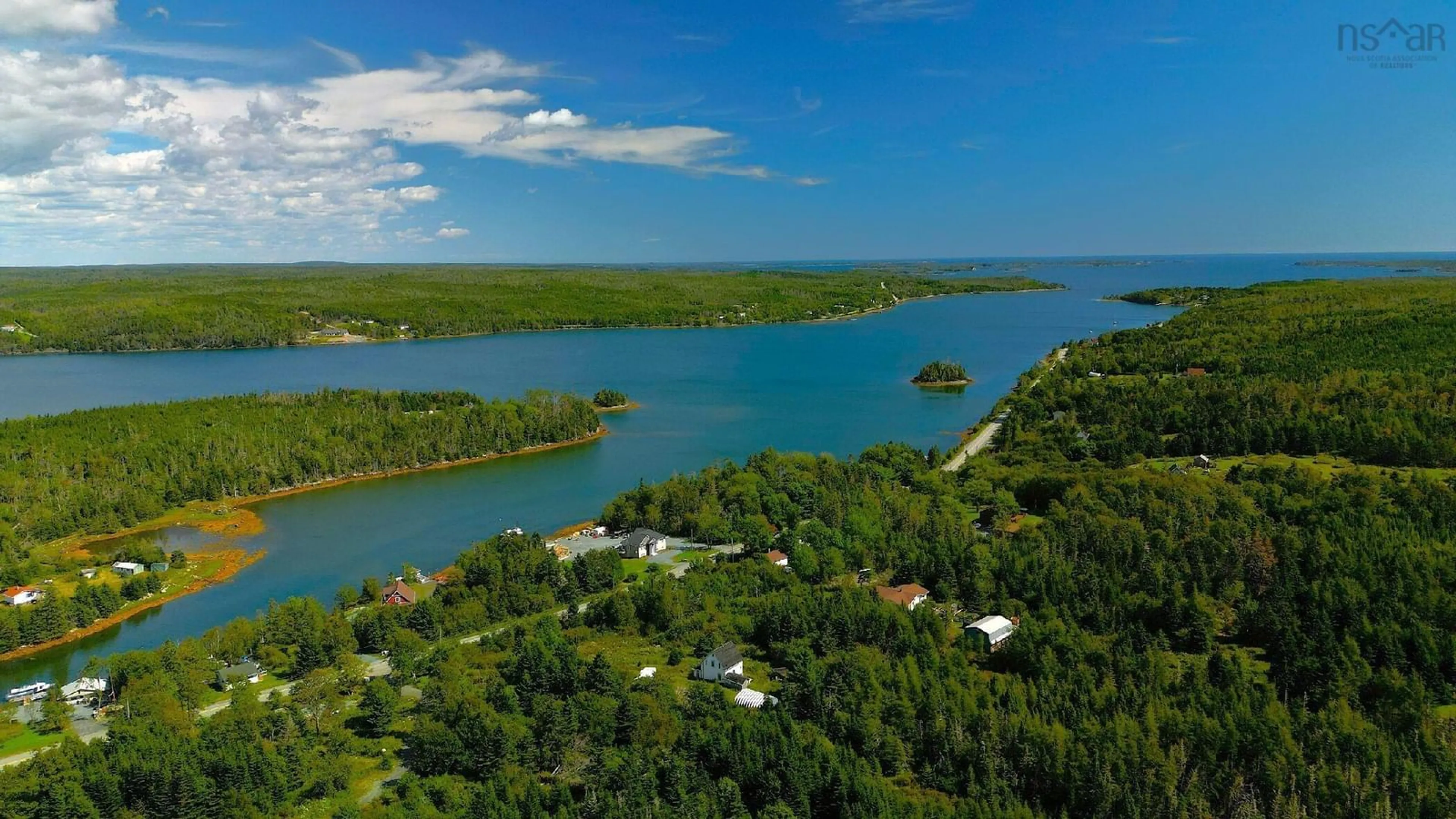 A pic from outside/outdoor area/front of a property/back of a property/a pic from drone, water/lake/river/ocean view for 960 West Ship Harbour Rd, Lower Ship Harbour Nova Scotia B0J 2L0