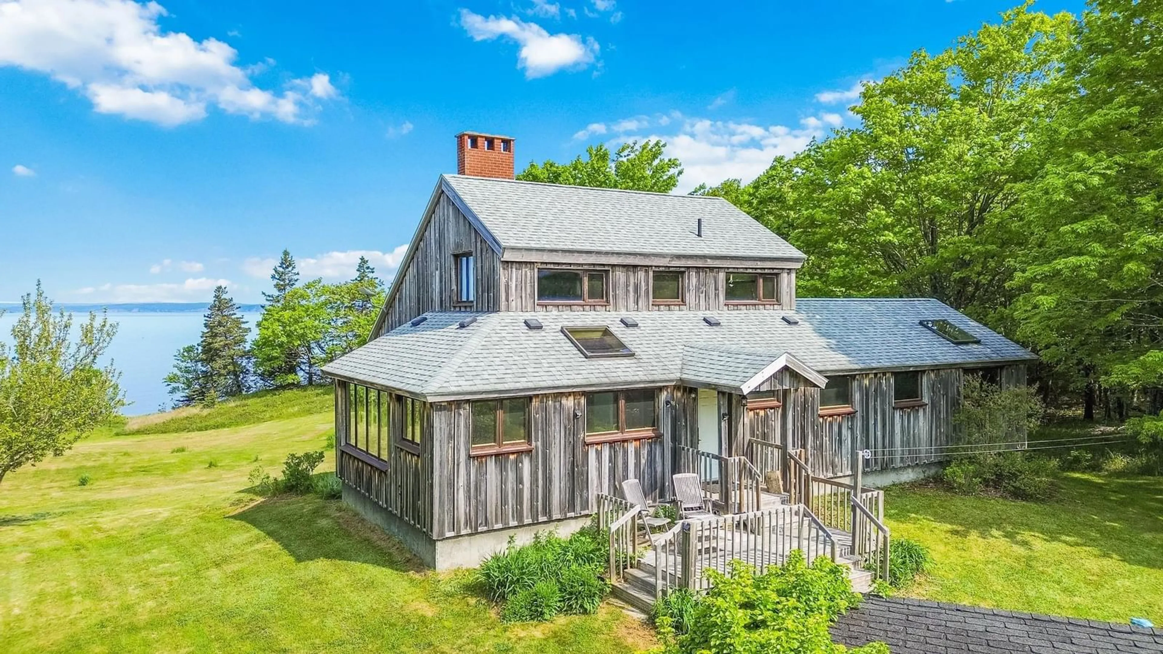A pic from outside/outdoor area/front of a property/back of a property/a pic from drone, unknown for 203 Al Bennett Rd, Halls Harbour Nova Scotia B0P 1J0