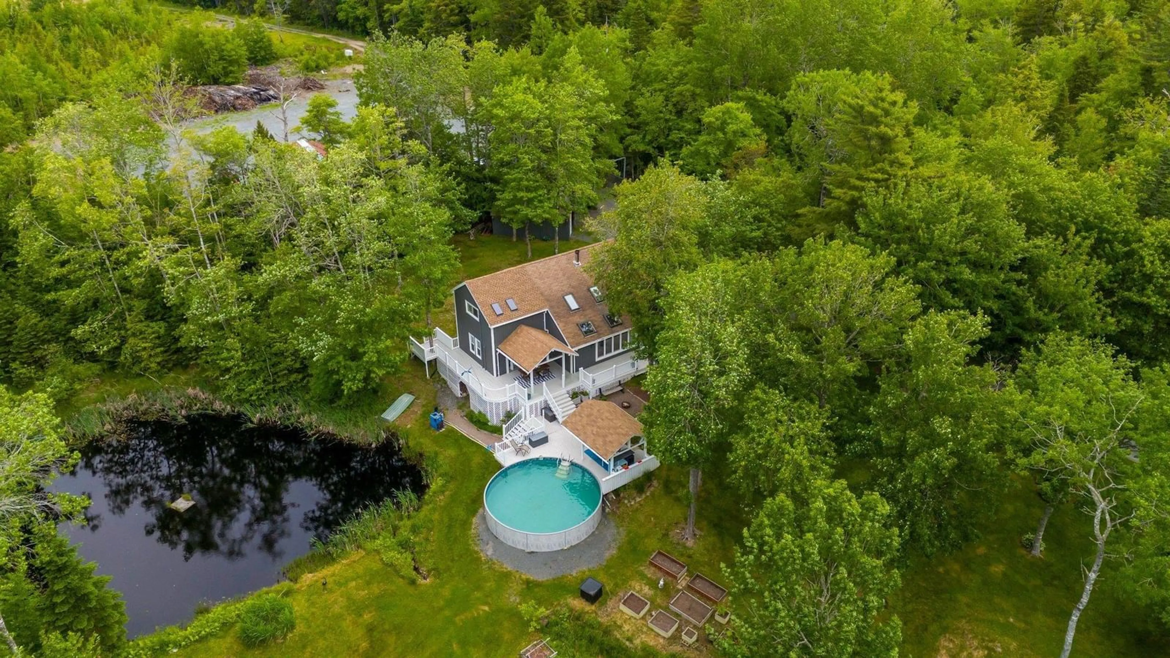 A pic from outside/outdoor area/front of a property/back of a property/a pic from drone, water/lake/river/ocean view for 321 Elliot Rd, South Rawdon Nova Scotia B0N 1Z0