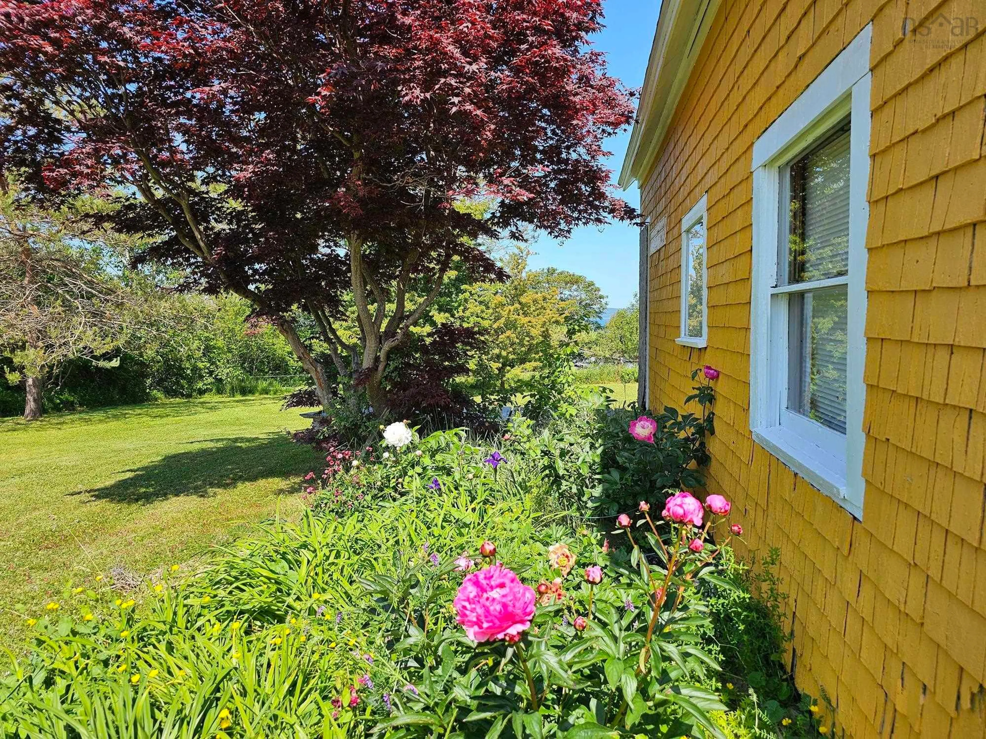 A pic from outside/outdoor area/front of a property/back of a property/a pic from drone, water/lake/river/ocean view for 7213 Highway 101, Plympton Nova Scotia B0W 2R0