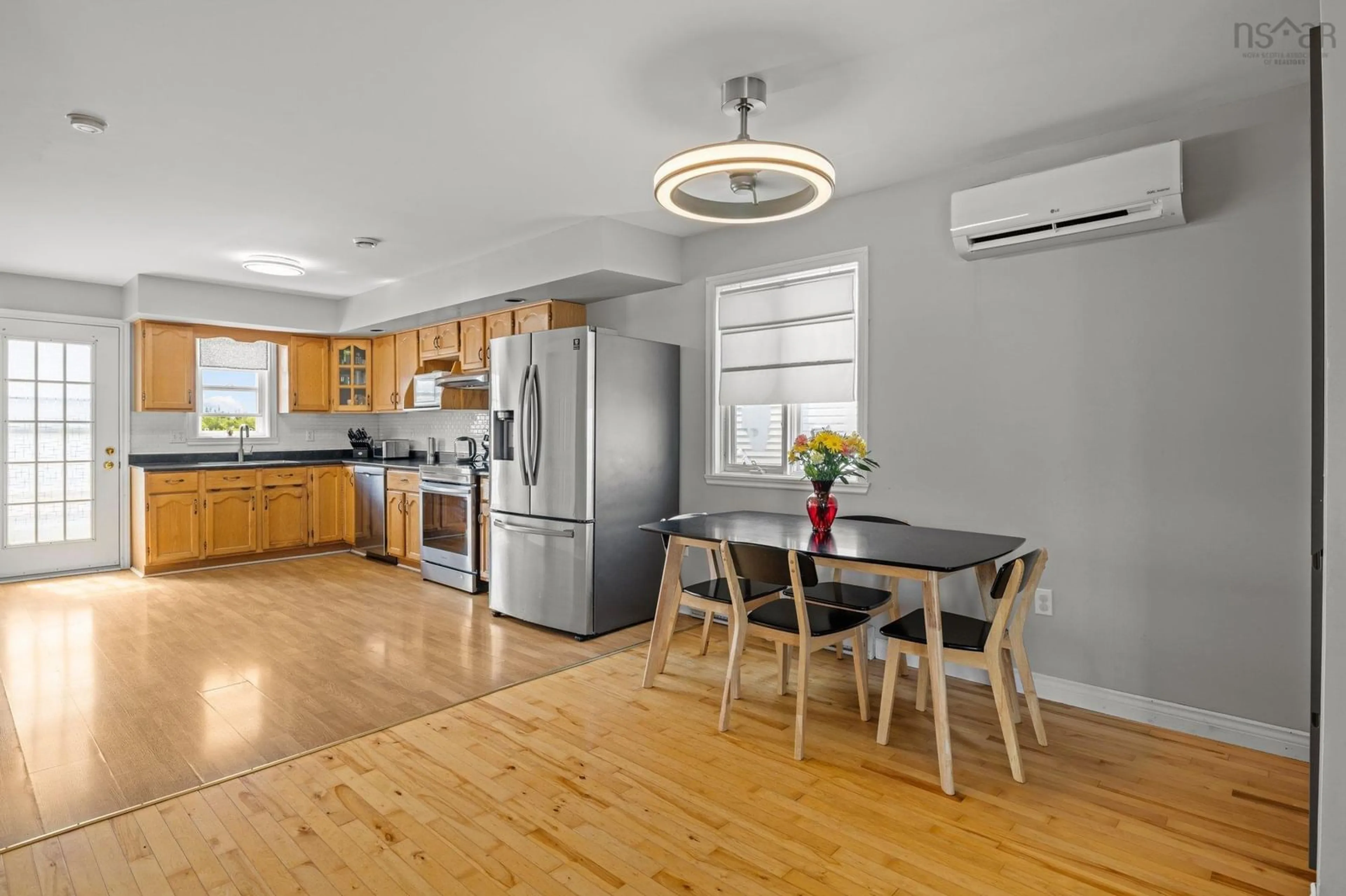 Open concept kitchen, wood/laminate floor for 193 Melrose Cres, Eastern Passage Nova Scotia B3G 1P2