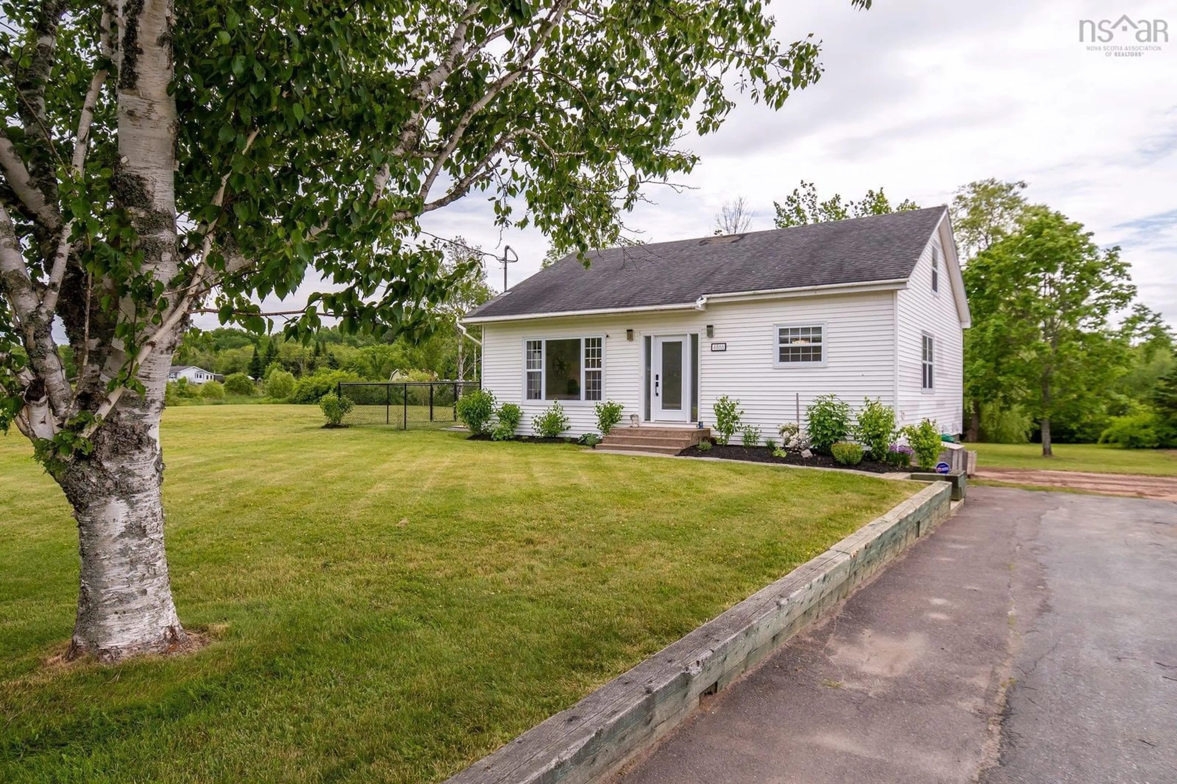 A pic from outside/outdoor area/front of a property/back of a property/a pic from drone, street for 4866 Highway 1, Three Mile Plains Nova Scotia B0N 2T0