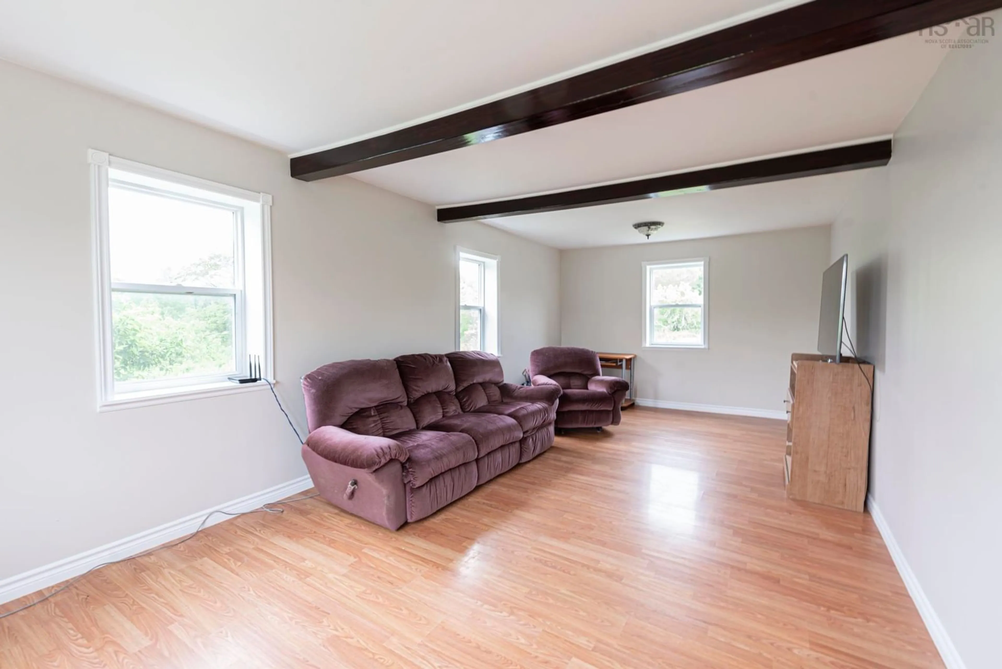 Living room with furniture, wood/laminate floor for 212 Browns Mountain Rd, Bailey's Brook Nova Scotia B0K 1G0