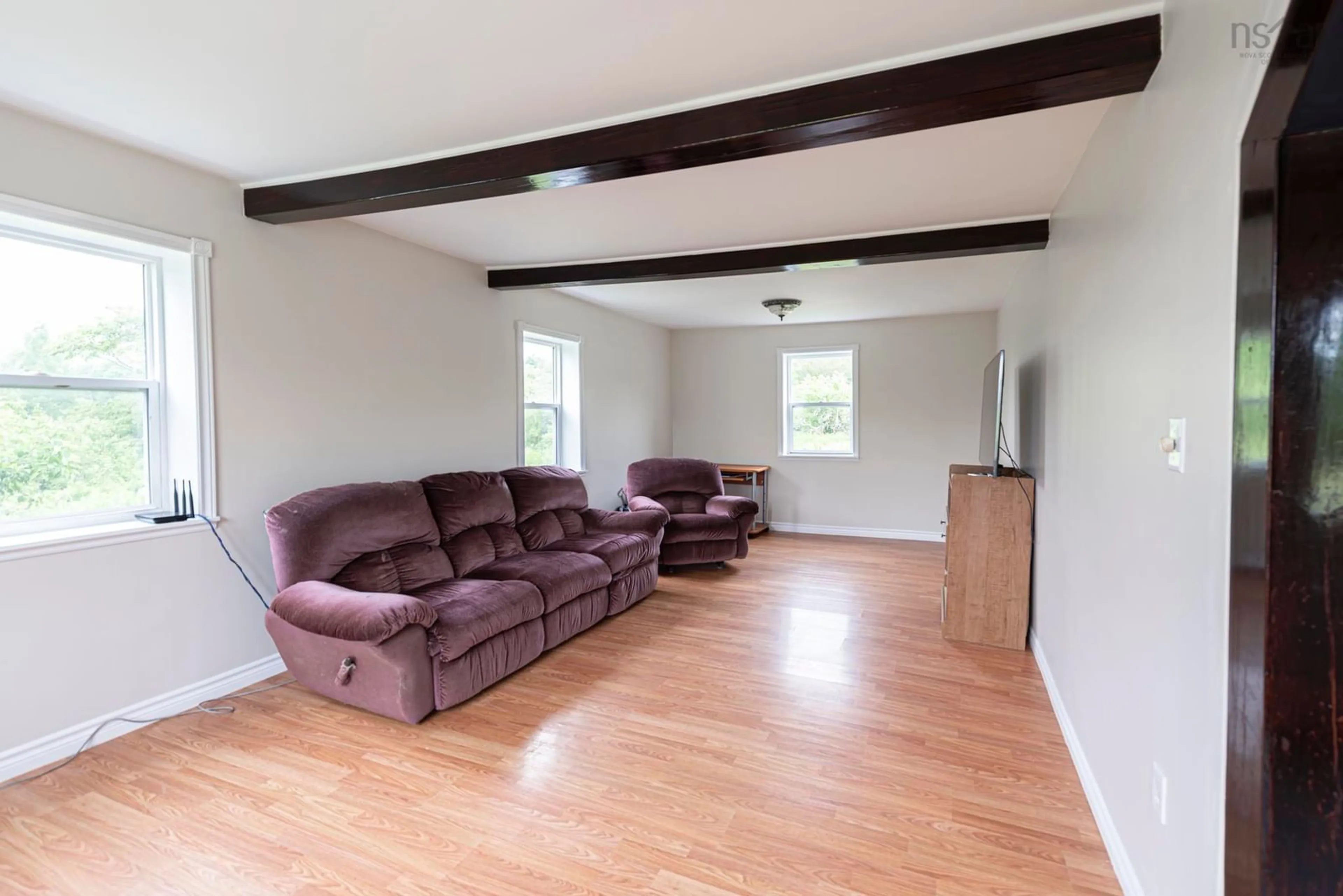 Living room with furniture, wood/laminate floor for 212 Browns Mountain Rd, Bailey's Brook Nova Scotia B0K 1G0