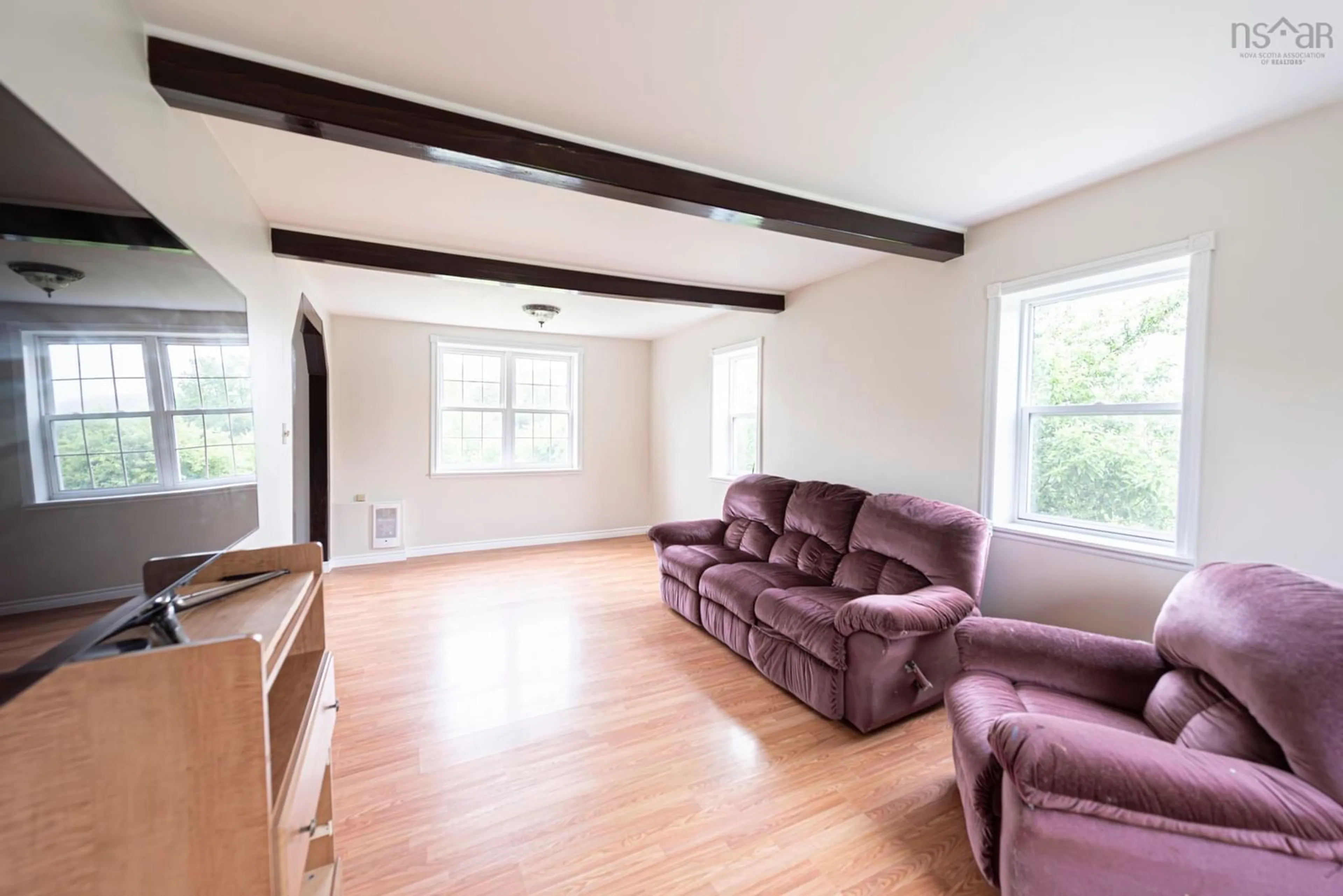 Living room with furniture, wood/laminate floor for 212 Browns Mountain Rd, Bailey's Brook Nova Scotia B0K 1G0