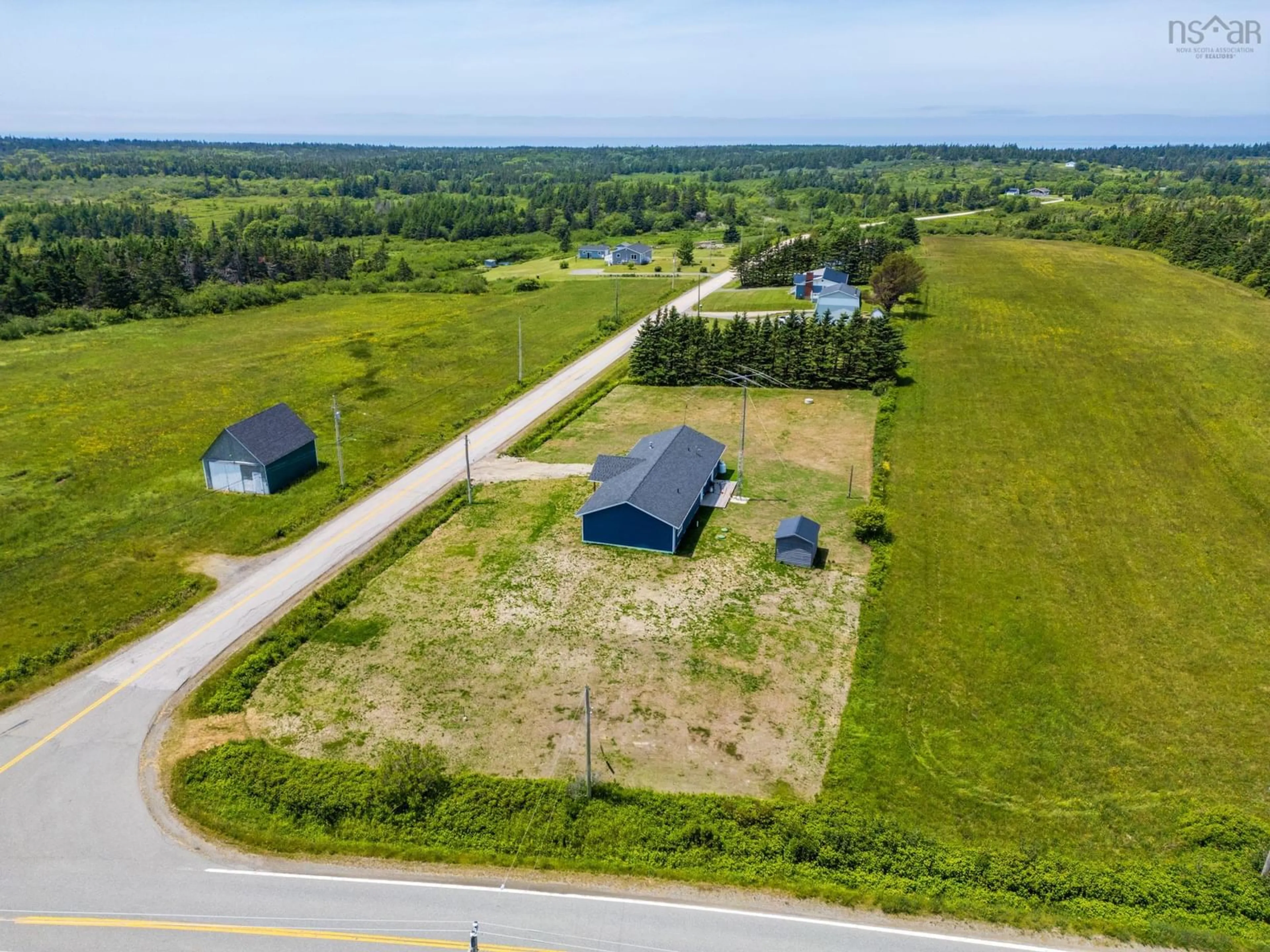 A pic from outside/outdoor area/front of a property/back of a property/a pic from drone, water/lake/river/ocean view for 12 Bear Cove Rd, St. Alphonse Nova Scotia B0W 2J0