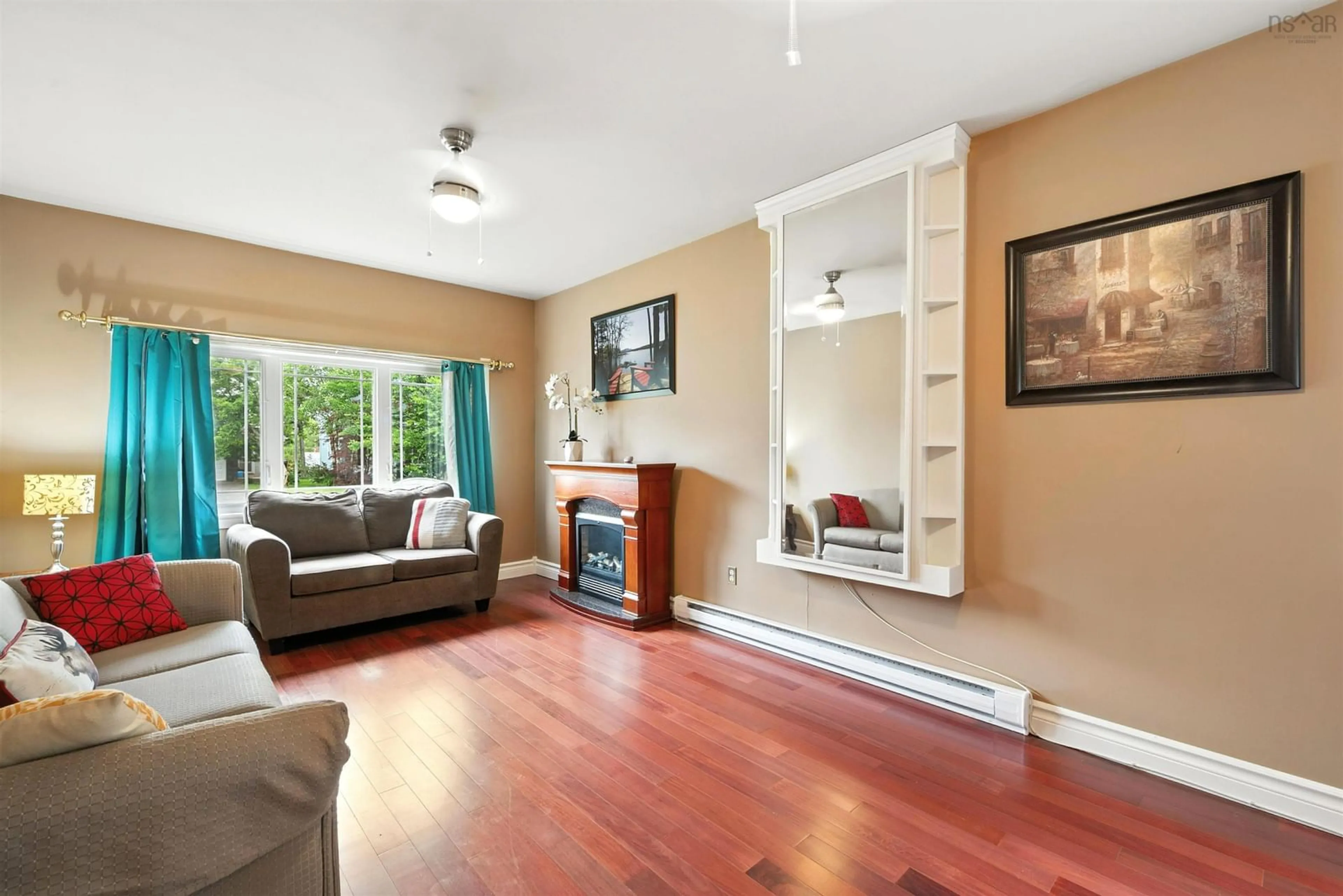 Living room with furniture, wood/laminate floor for 10 Penstock Crt, Middle Sackville Nova Scotia B4E 2L5