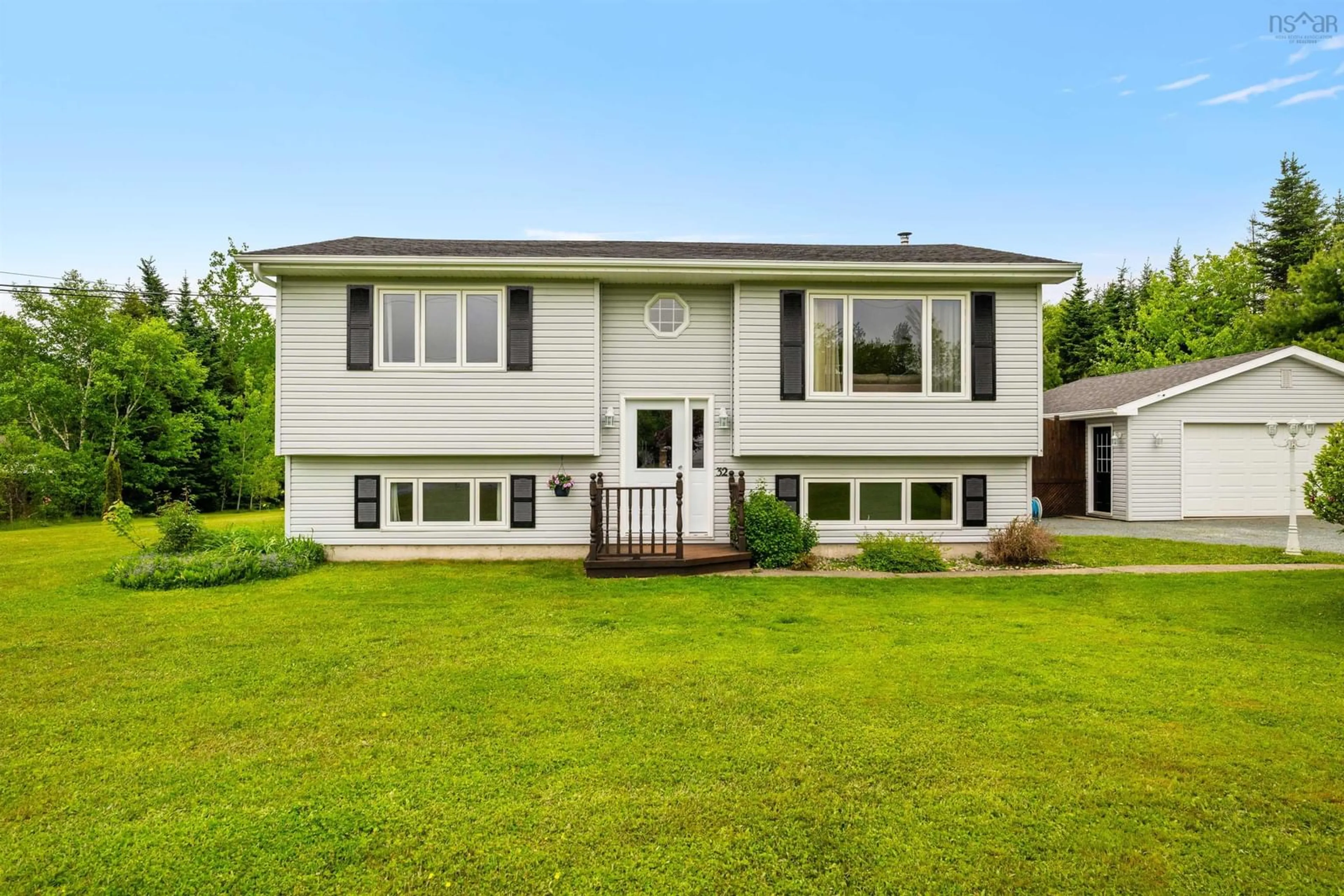 Home with vinyl exterior material, street for 32 O'connell Dr, Porters Lake Nova Scotia B3E 1E8