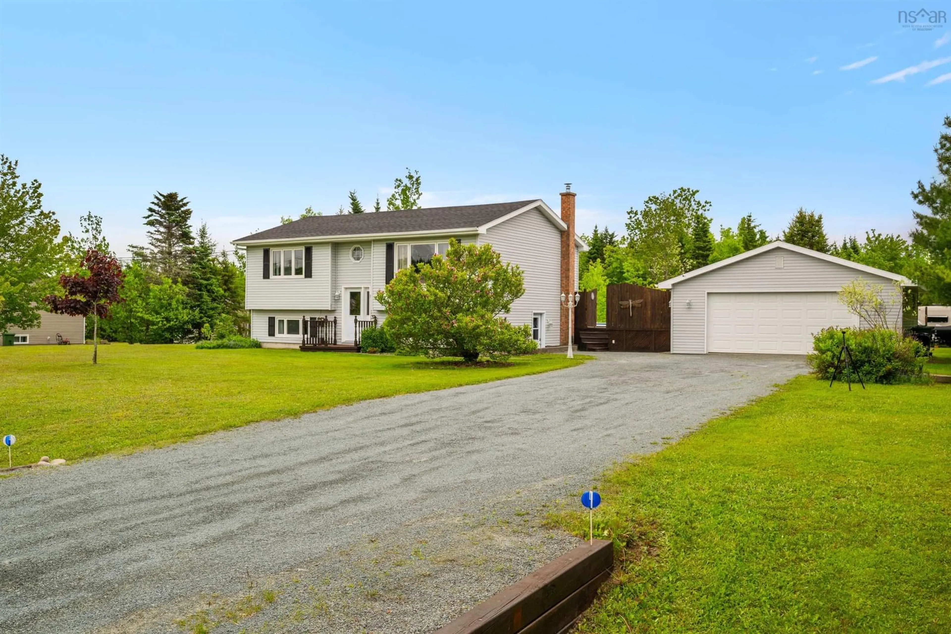 A pic from outside/outdoor area/front of a property/back of a property/a pic from drone, street for 32 O'connell Dr, Porters Lake Nova Scotia B3E 1E8