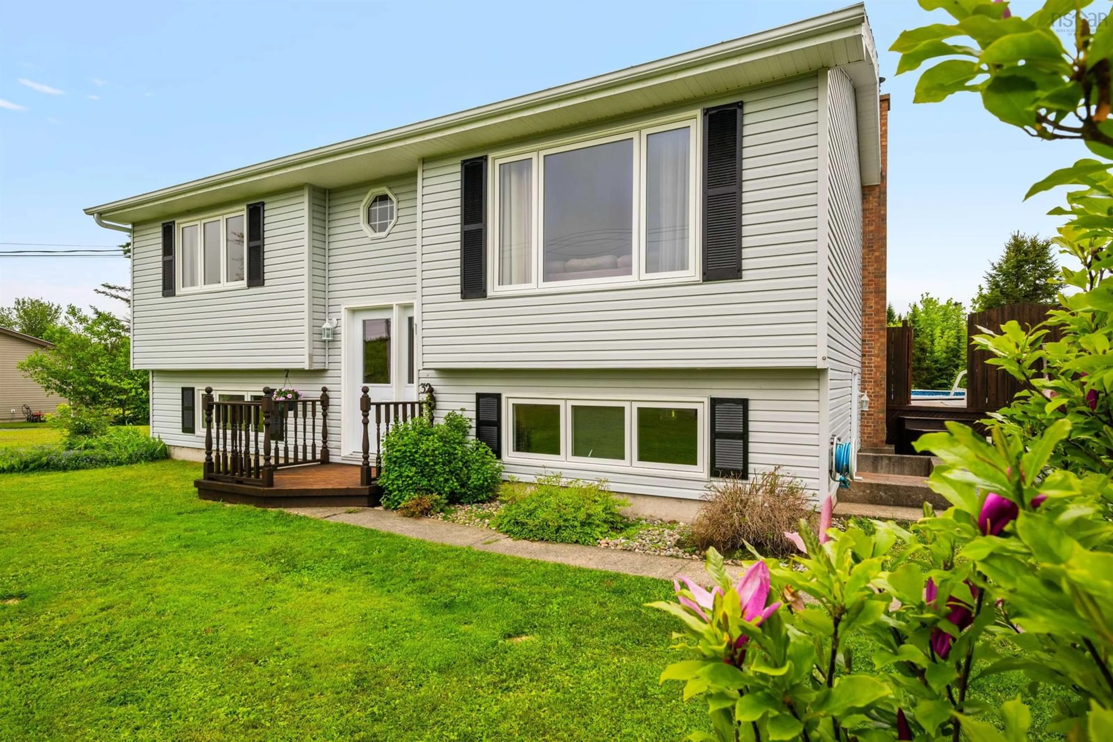 Home with vinyl exterior material, street for 32 O'connell Dr, Porters Lake Nova Scotia B3E 1E8