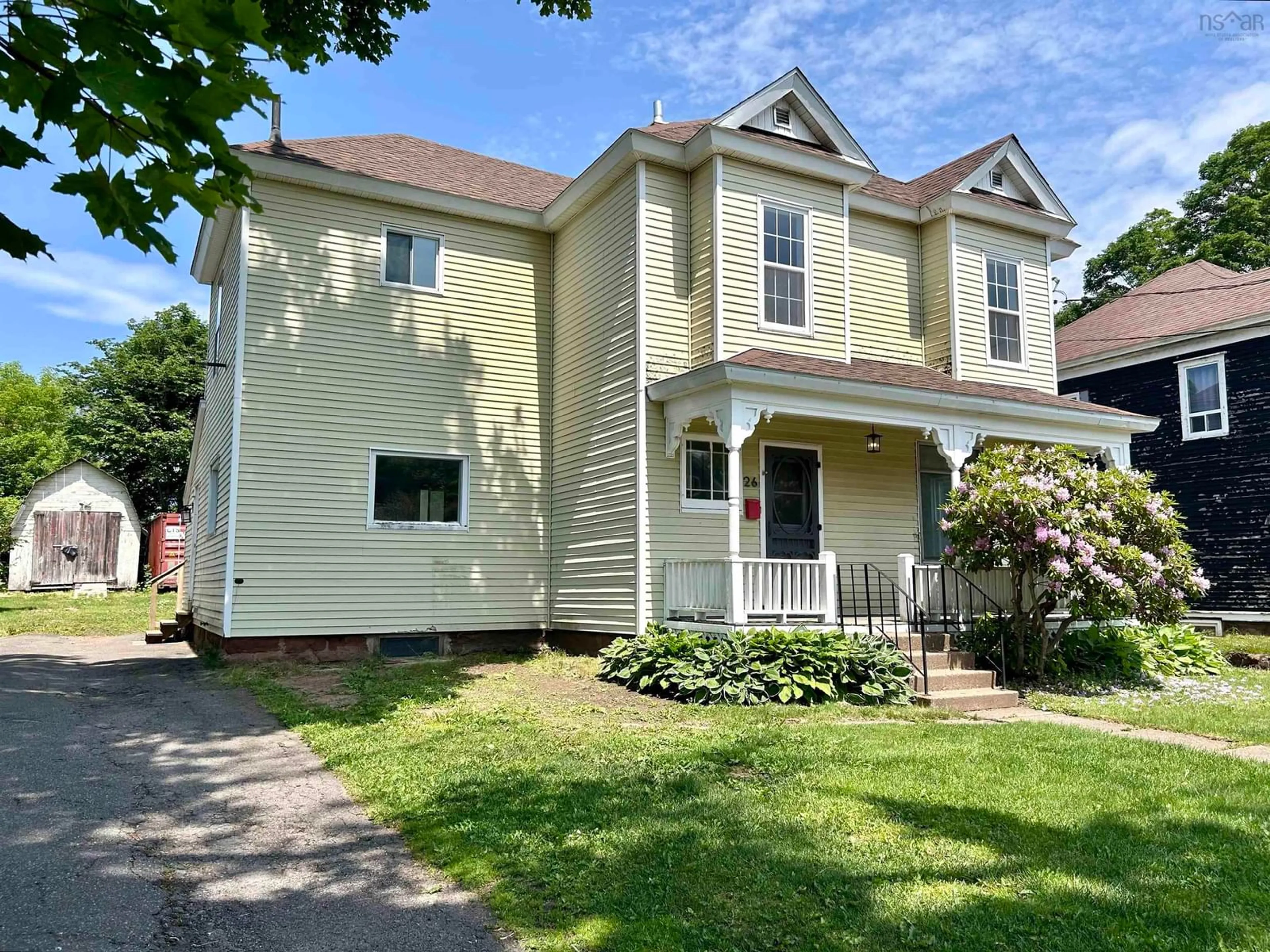 Home with vinyl exterior material, street for 26 Queen St, Amherst Nova Scotia B4H 1P9